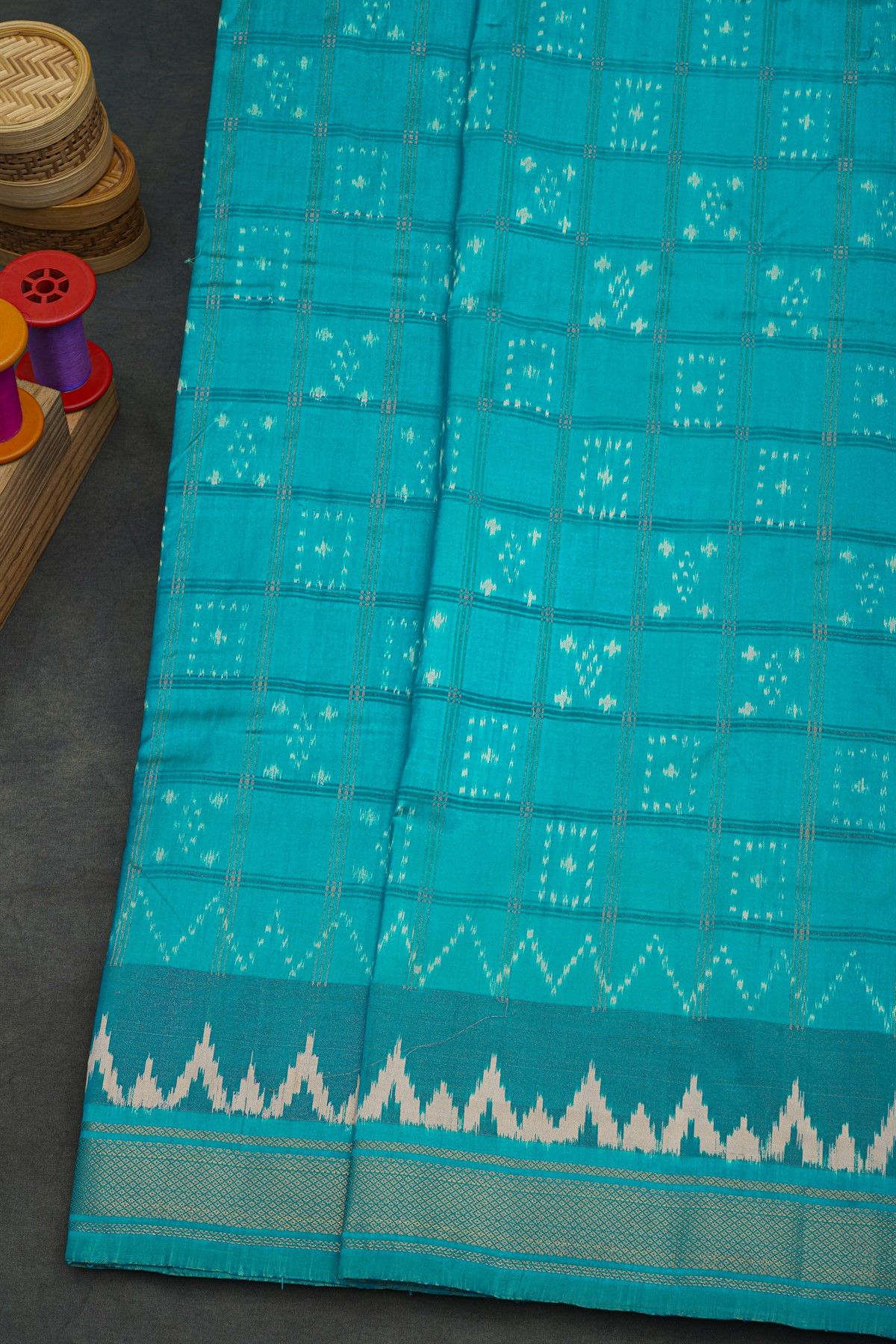 Pochampally Ikat Silk Sky Blue Saree With Floral And Butti In Checks Body