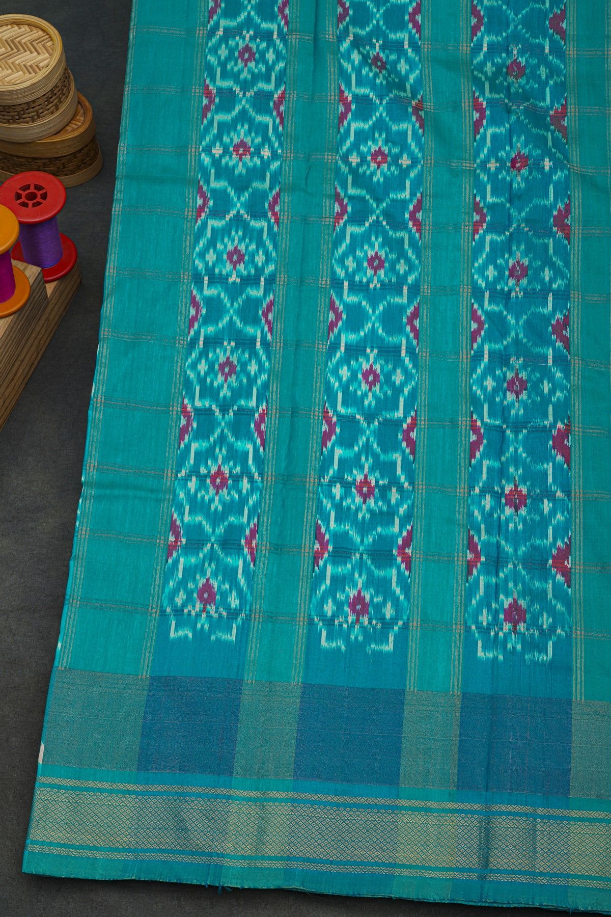 Pochampally Ikat Silk Sky Blue Saree With Floral And Butti In Checks Body