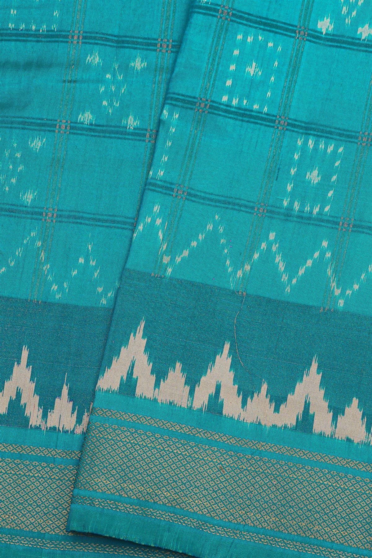 Pochampally Ikat Silk Sky Blue Saree With Floral And Butti In Checks Body