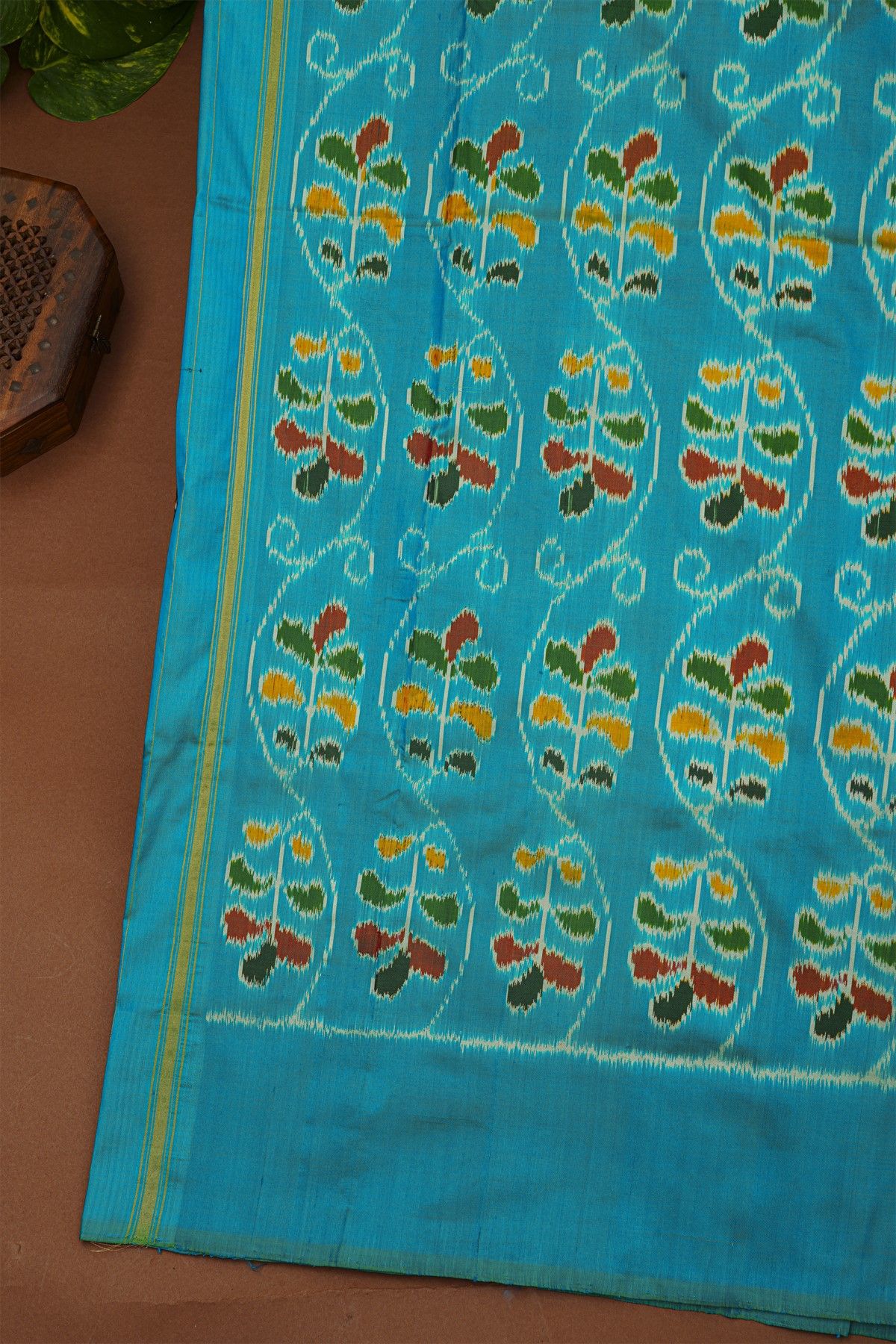 Ikat Silk Black Saree With Florals And Deers In Ikat Design Body