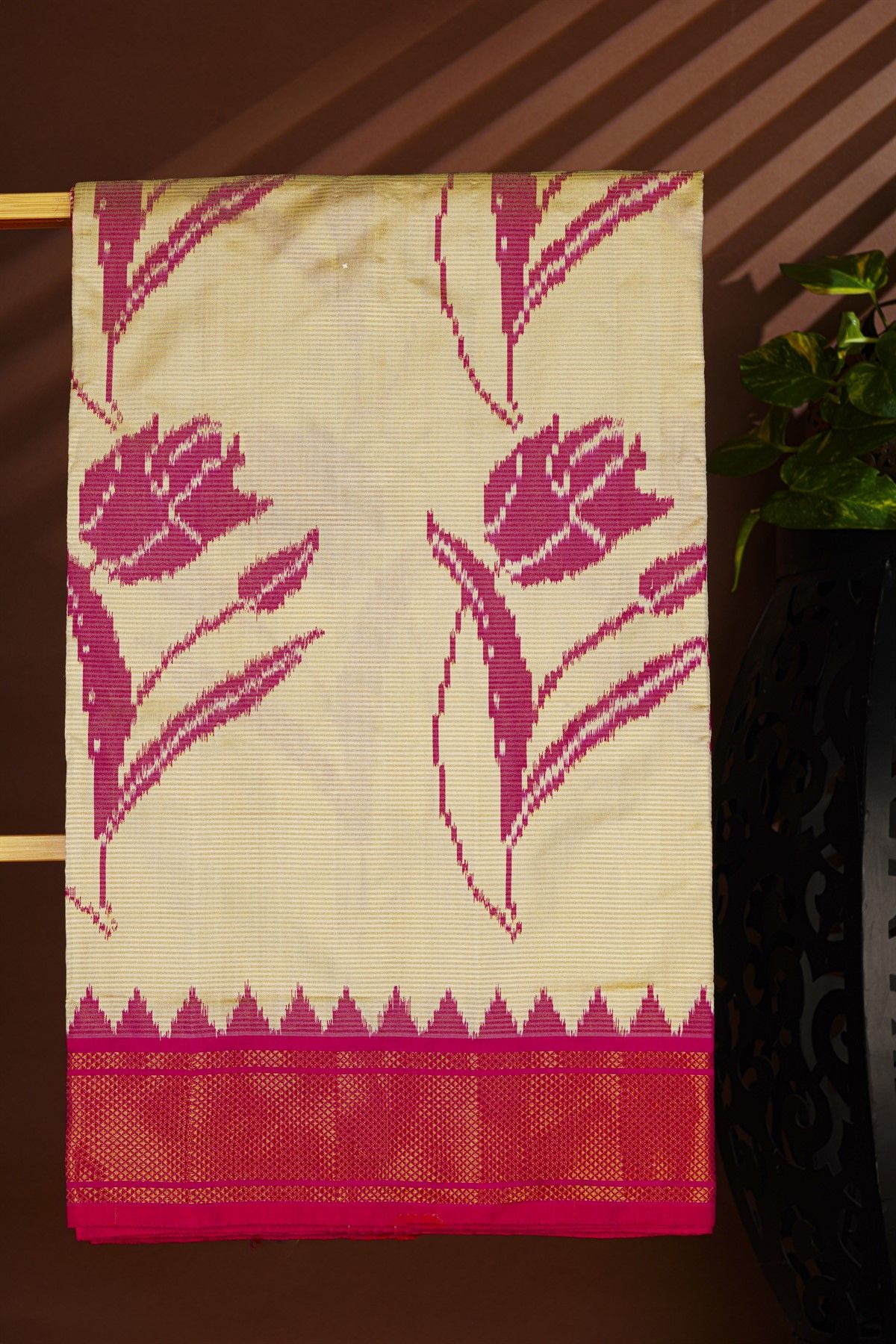 Ikat Silk Cream Saree With Florals And Leaves In Ikat Design Body