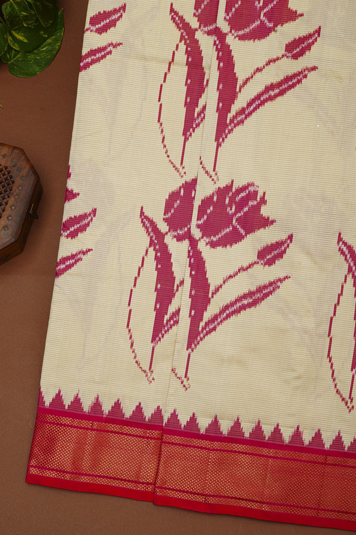 Ikat Silk Cream Saree With Florals And Leaves In Ikat Design Body