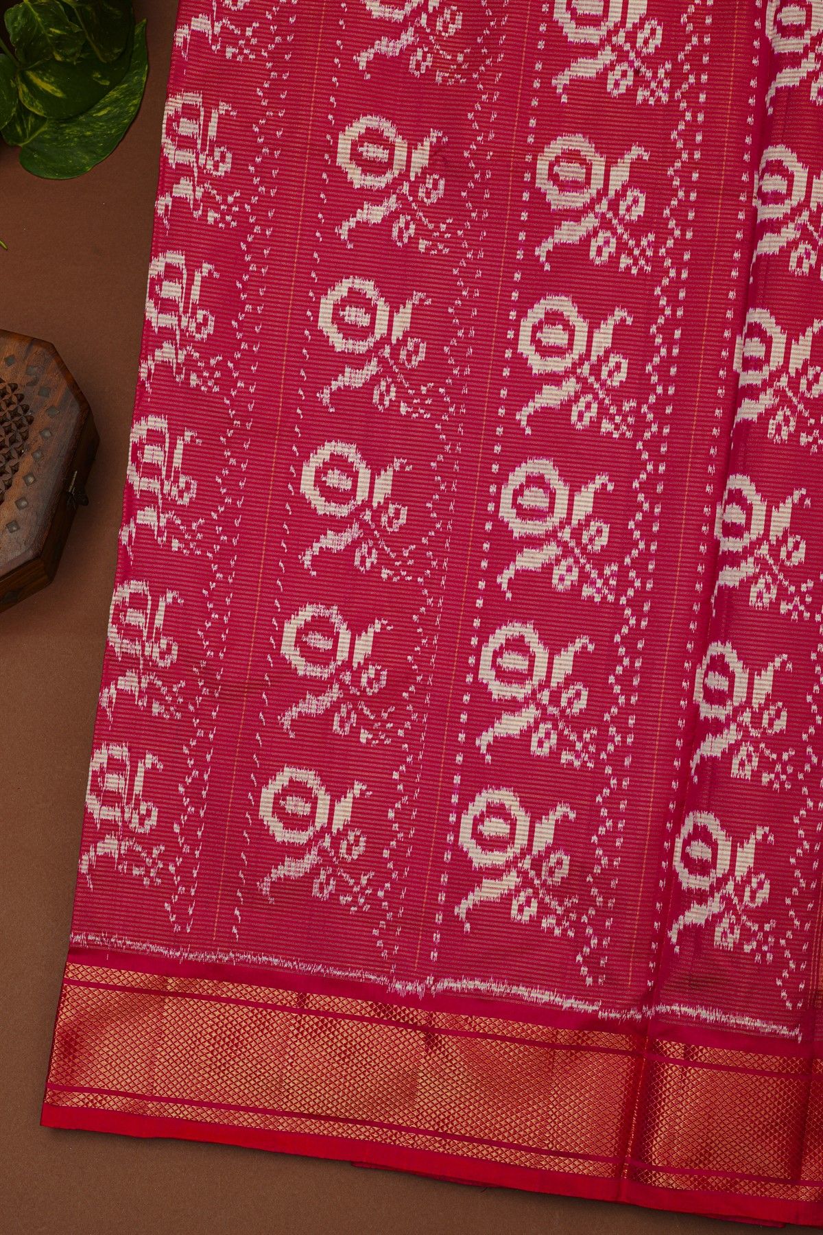 Ikat Silk Cream Saree With Florals And Leaves In Ikat Design Body