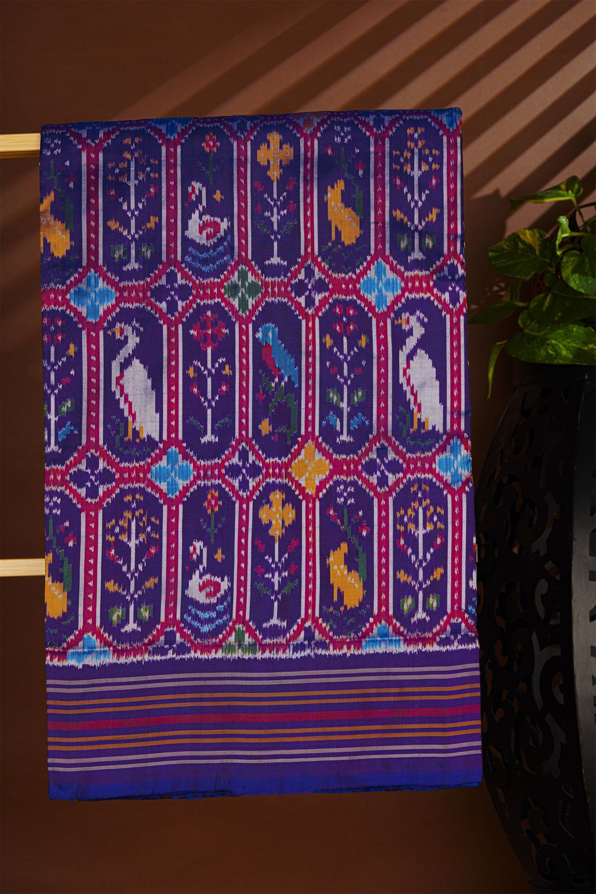 Ikat Silk Navy Blue Saree With Florals And Swans In Ikat Design Body