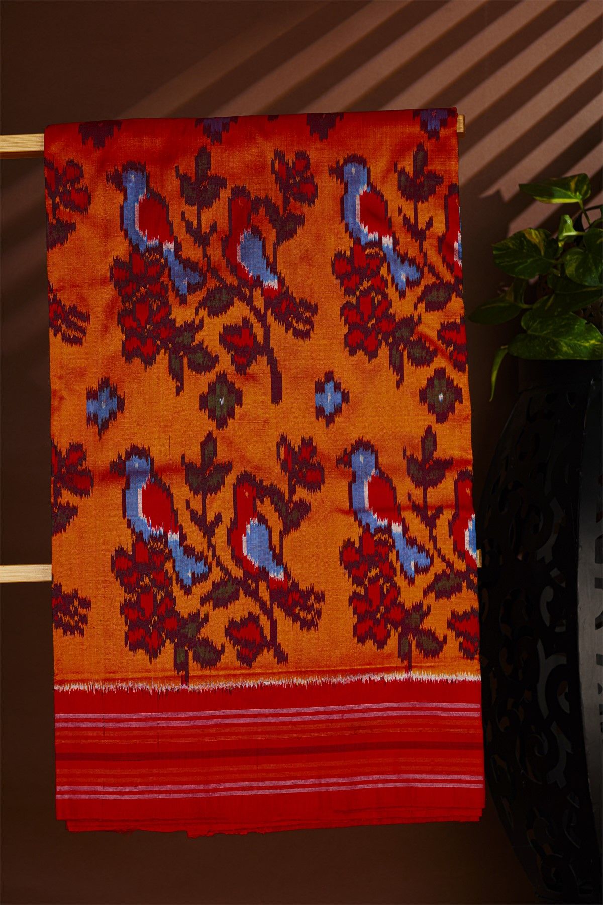 Ikat Silk Orange Saree With Florals And Birds In Ikat Design Body