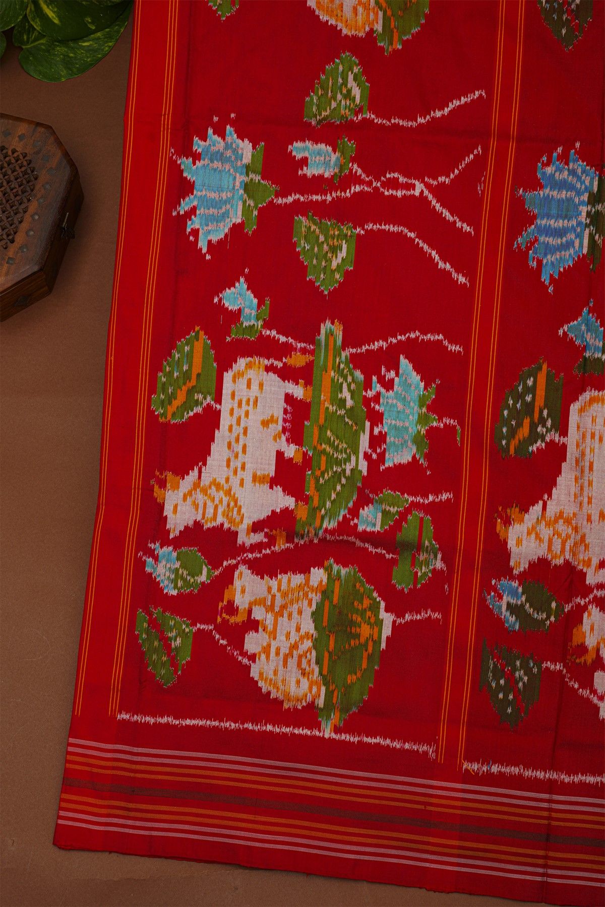 Ikat Silk Orange Saree With Florals And Birds In Ikat Design Body