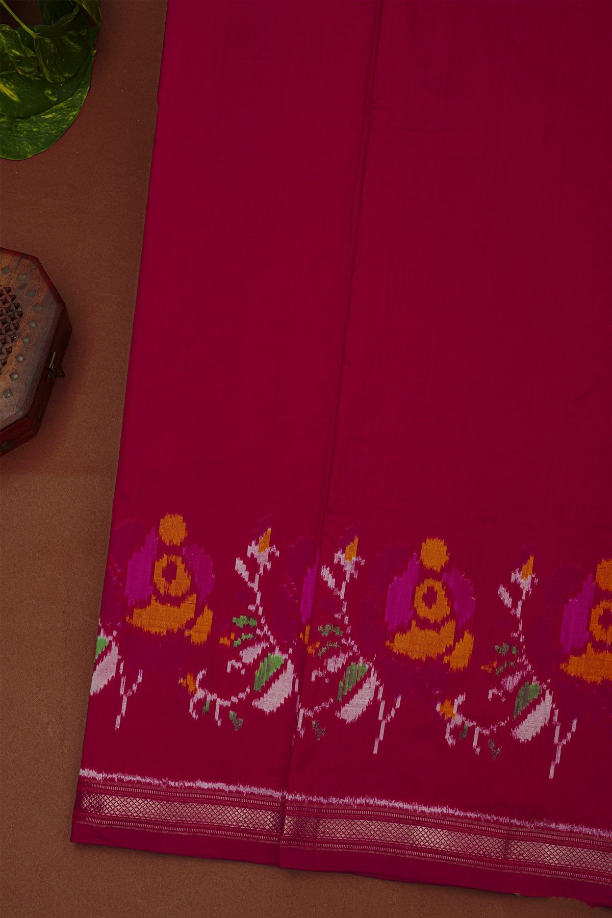 Ikat Silk Magenta Saree With Multicolor Floral Motif Border And Zari Stripes