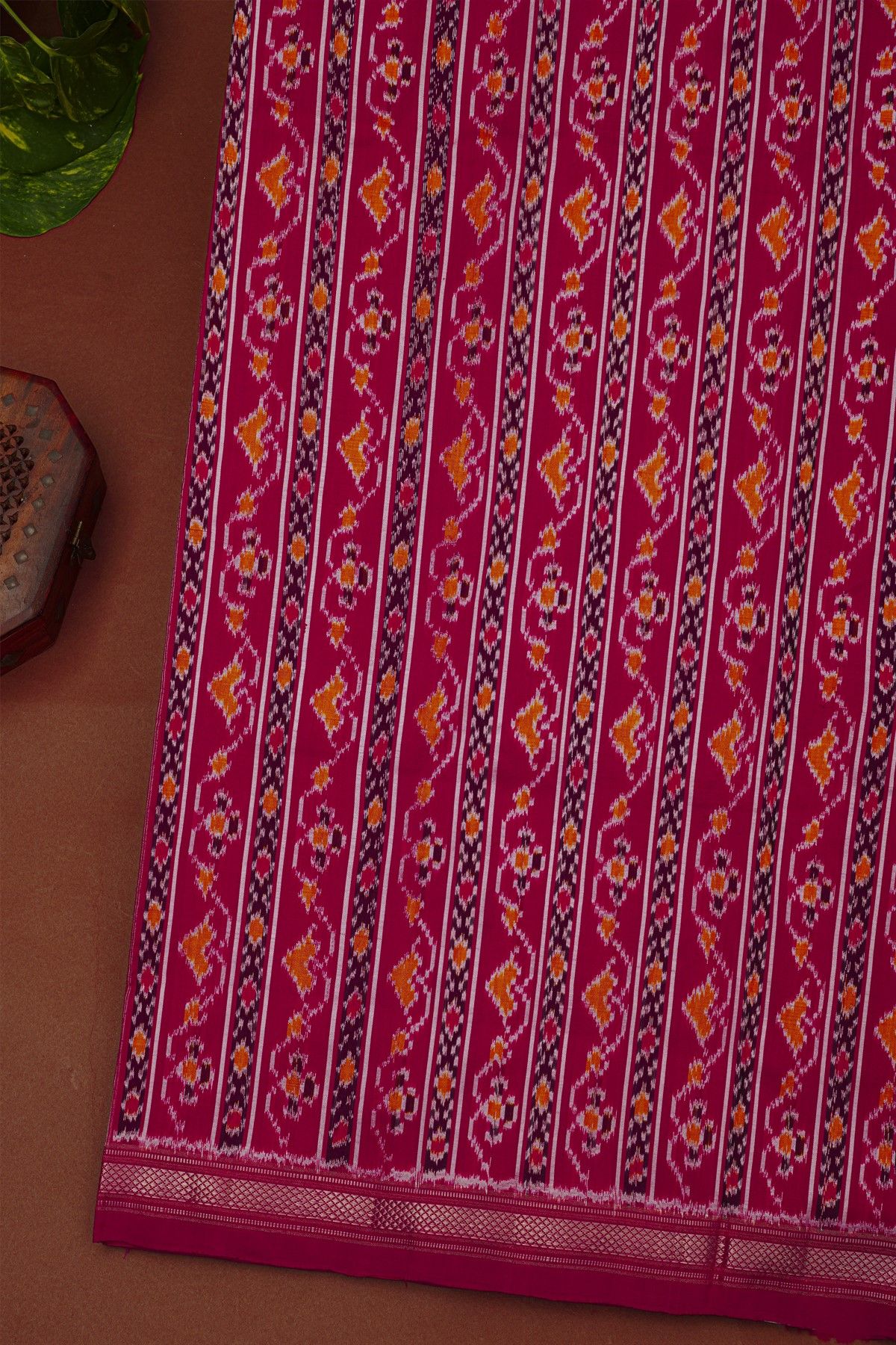 Ikat Silk Magenta Saree With Multicolor Floral Motif Border And Zari Stripes