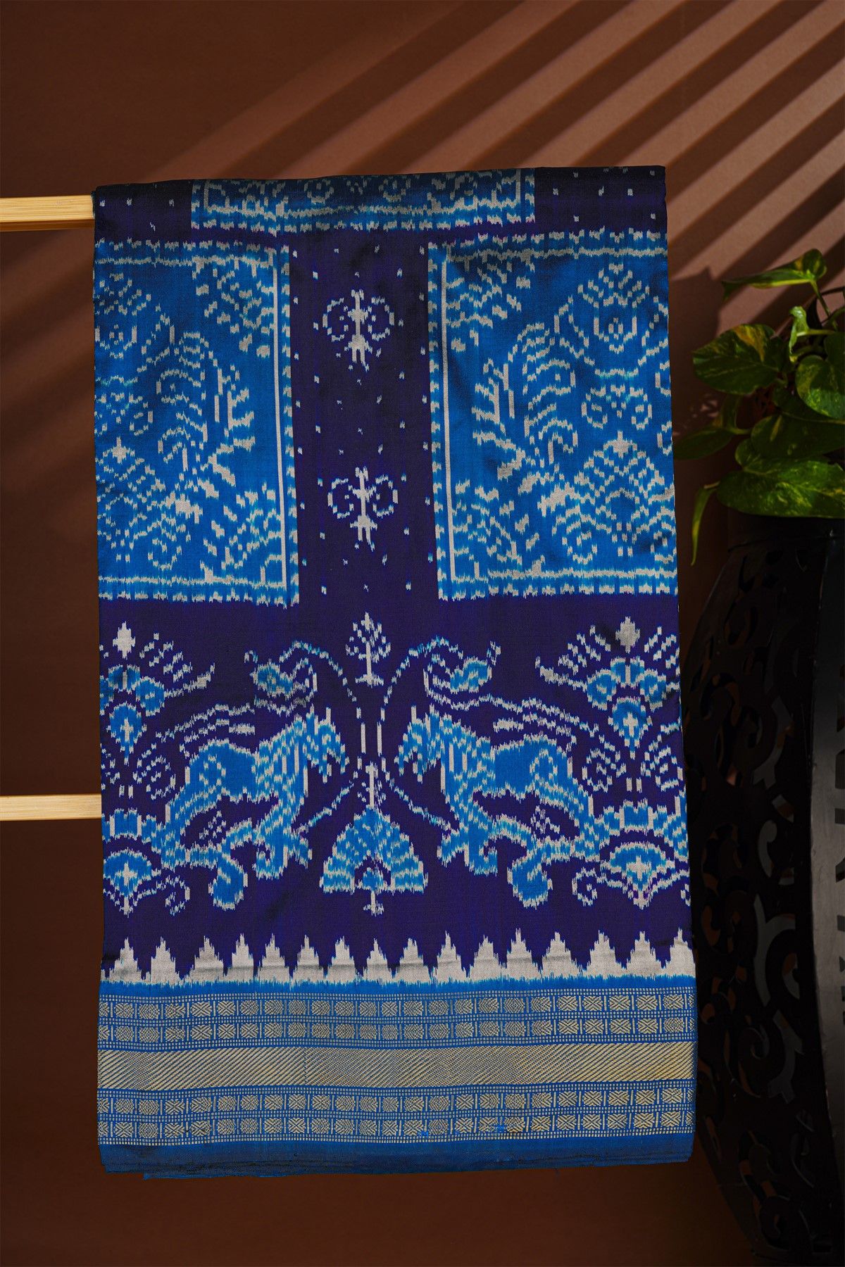 Ikat Silk Navy Blue Saree With Florals And Animals In Ikat Design Body
