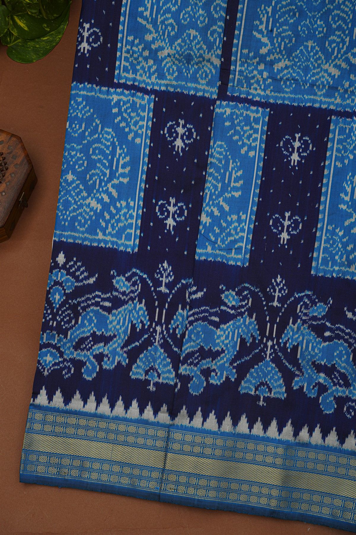 Ikat Silk Navy Blue Saree With Florals And Animals In Ikat Design Body
