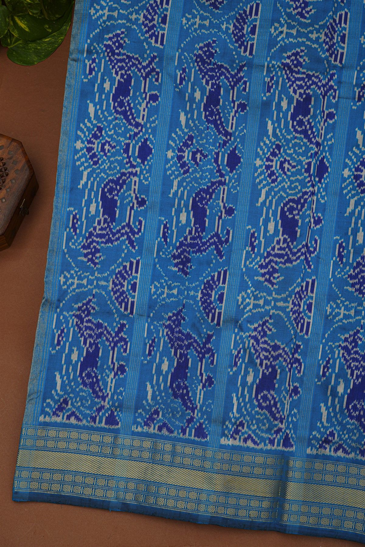 Ikat Silk Navy Blue Saree With Florals And Animals In Ikat Design Body