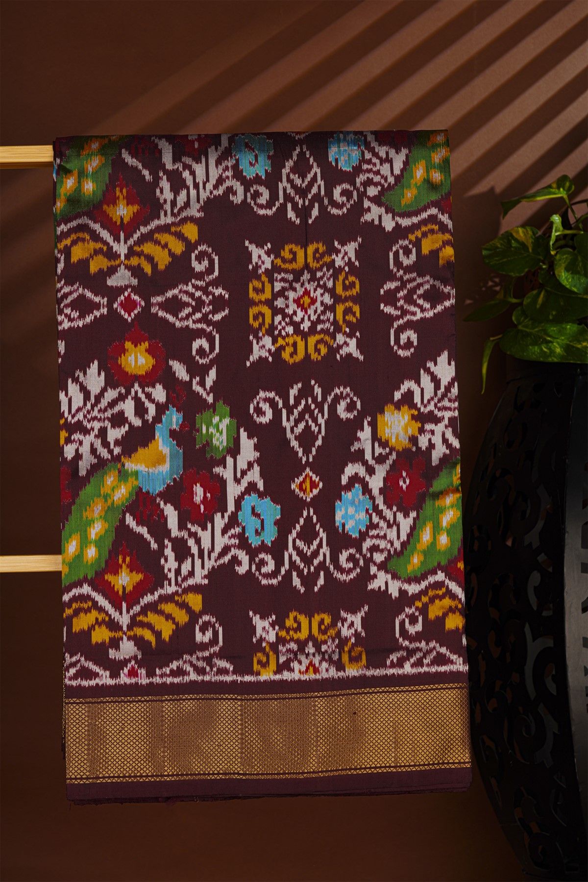 Ikat Silk Brown Saree With Florals And Leaves In Ikat Design Body
