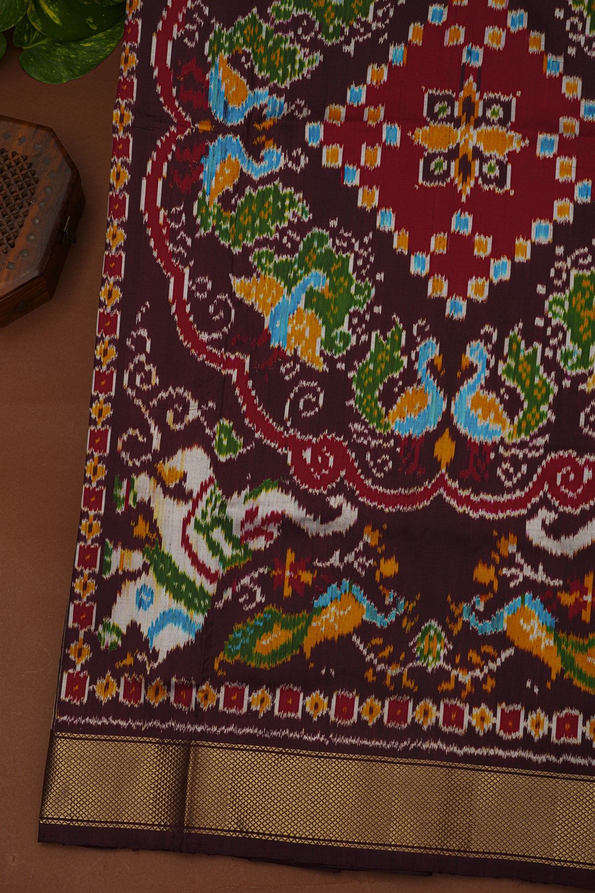 Ikat Silk Brown Saree With Florals And Leaves In Ikat Design Body