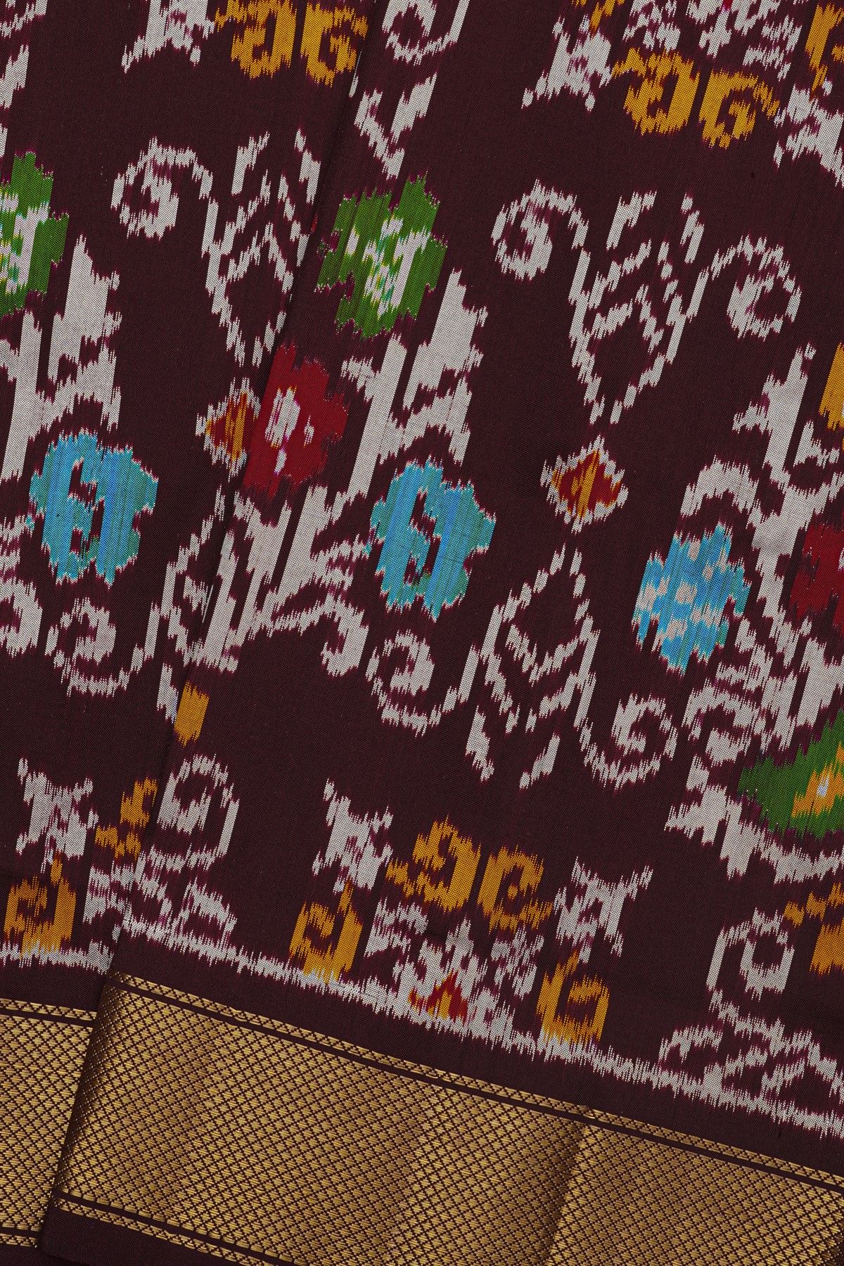 Ikat Silk Brown Saree With Florals And Leaves In Ikat Design Body