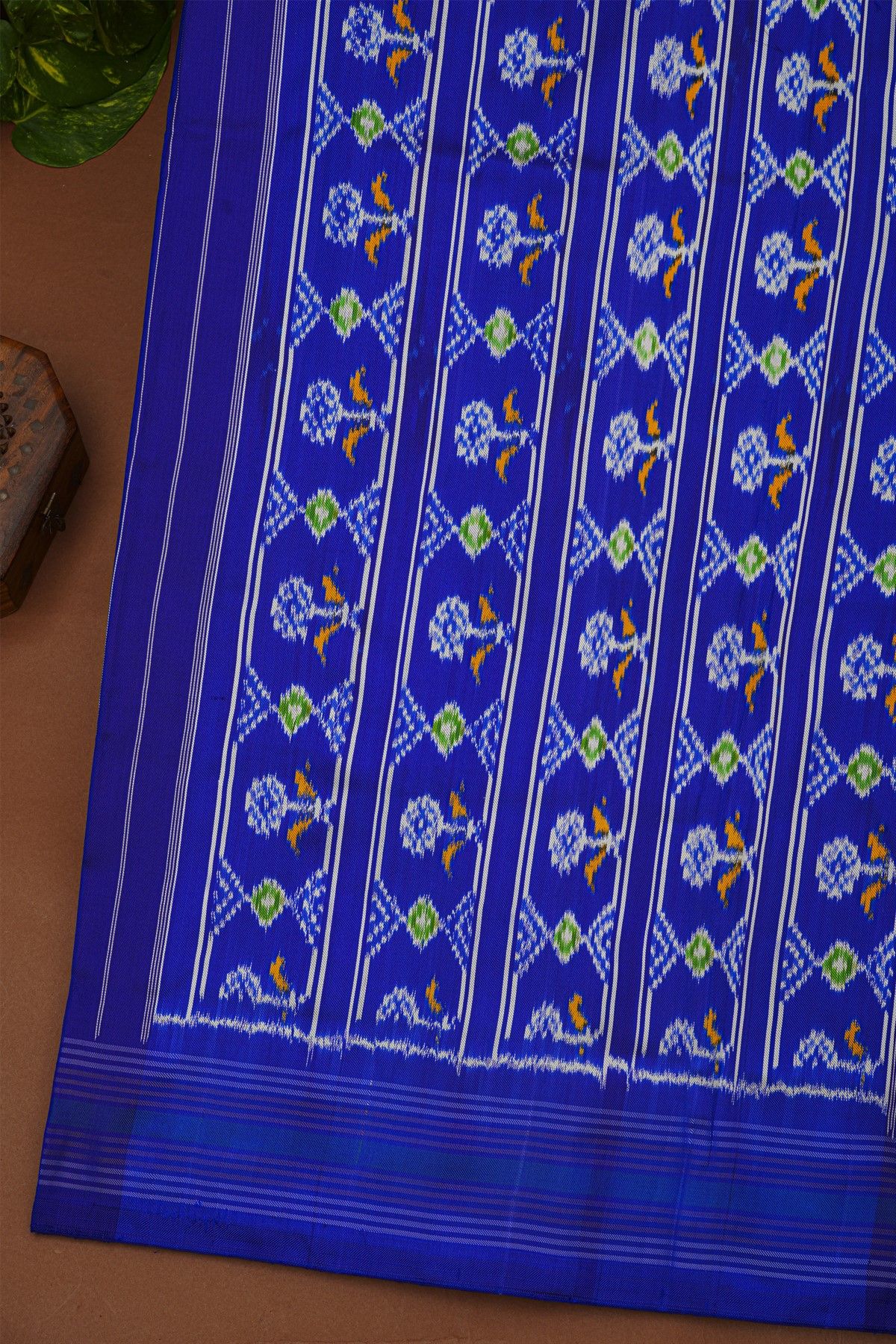 Ikat Silk Royal Blue Saree With Multicolor Floral Animal Motifs And Striped Border
