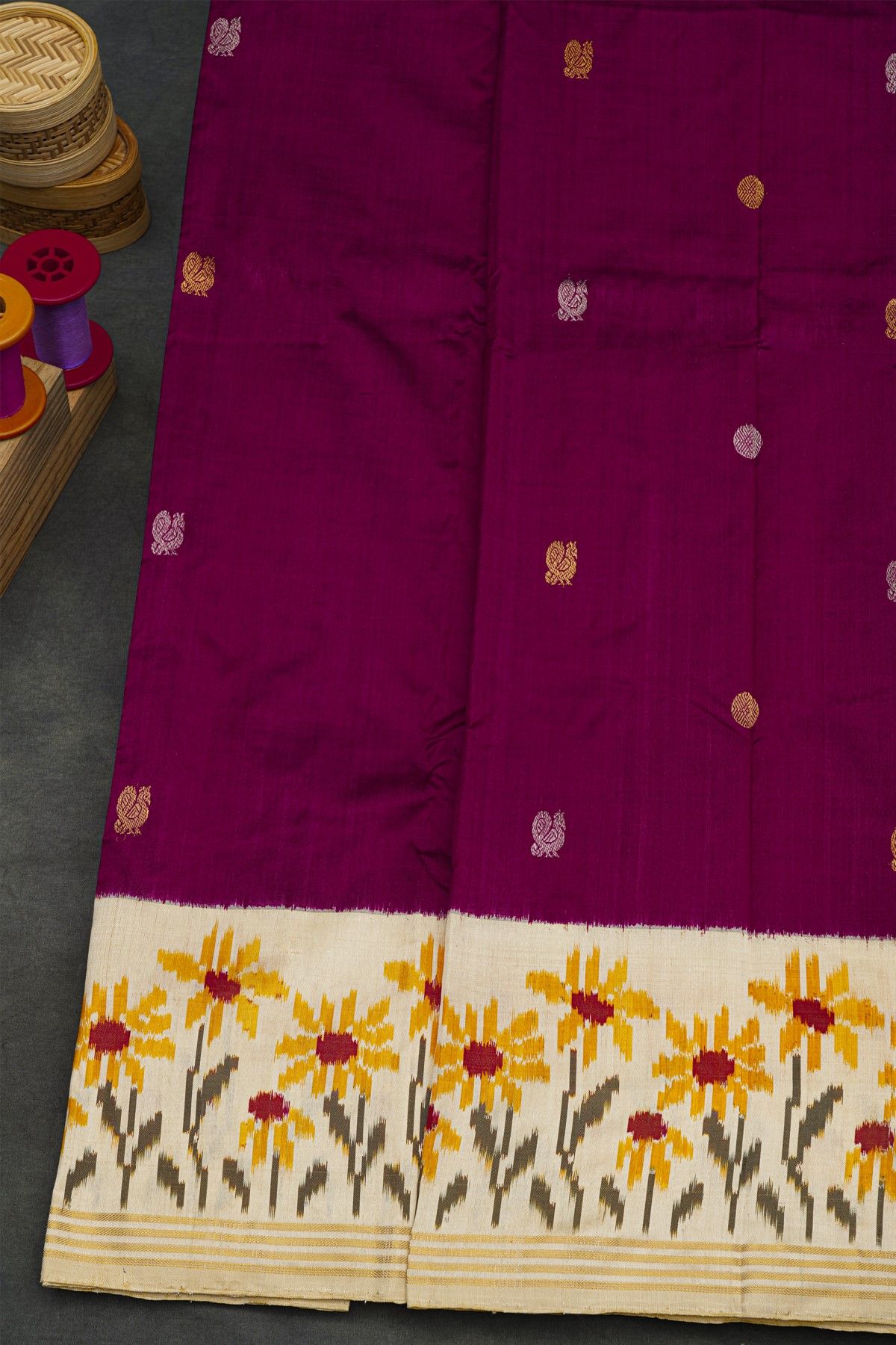 Ikat Silk Dark Purple Saree With Florals And Peacock Buttis Body