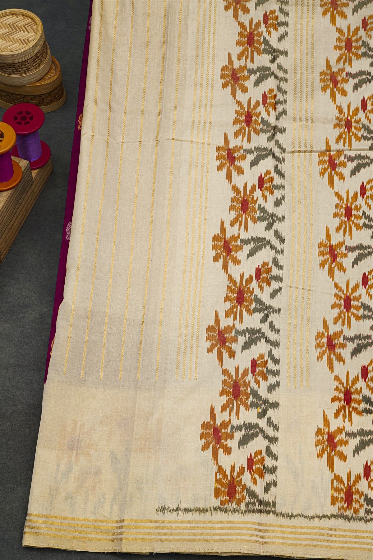 Ikat Silk Dark Purple Saree With Florals And Peacock Buttis Body