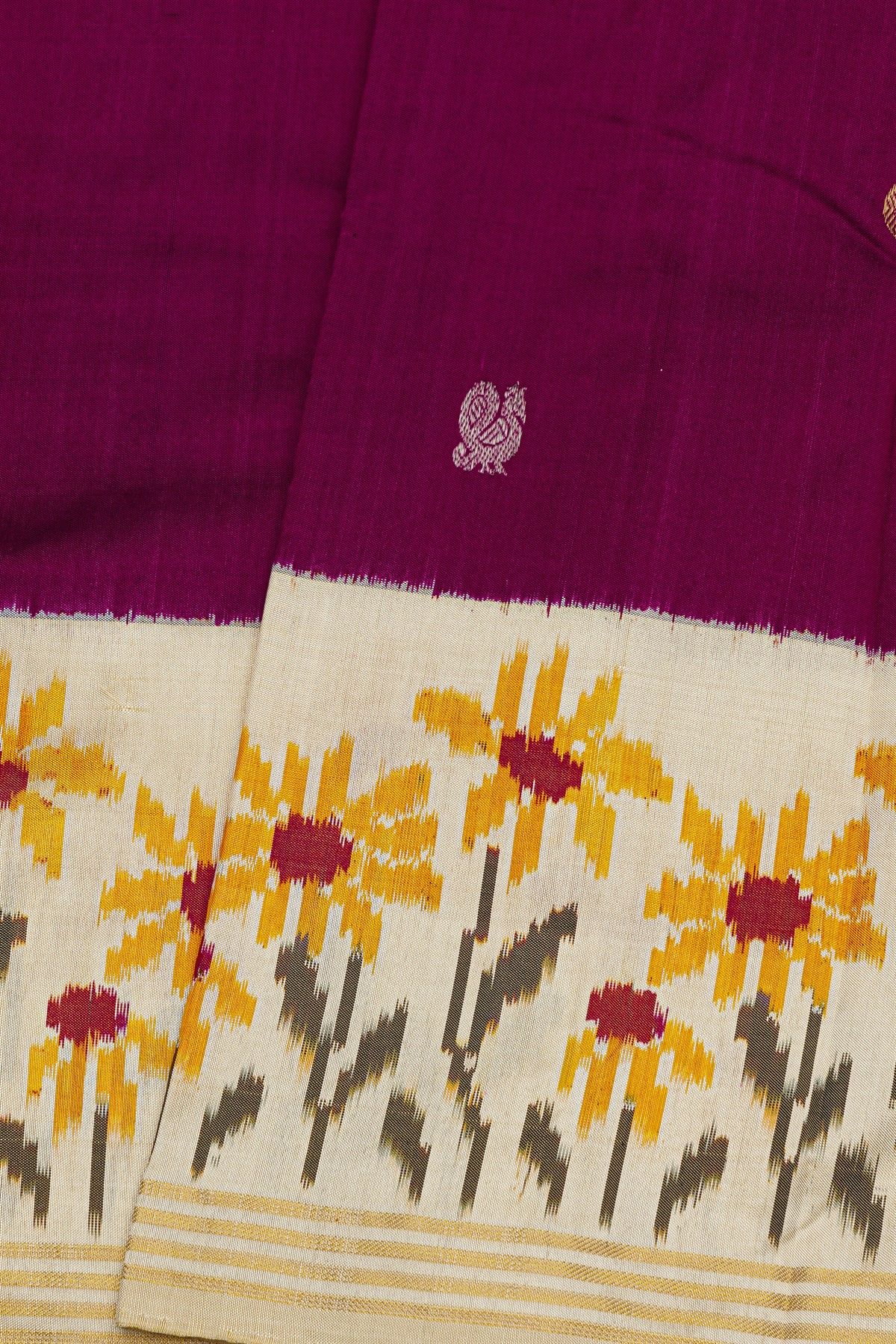 Ikat Silk Dark Purple Saree With Florals And Peacock Buttis Body