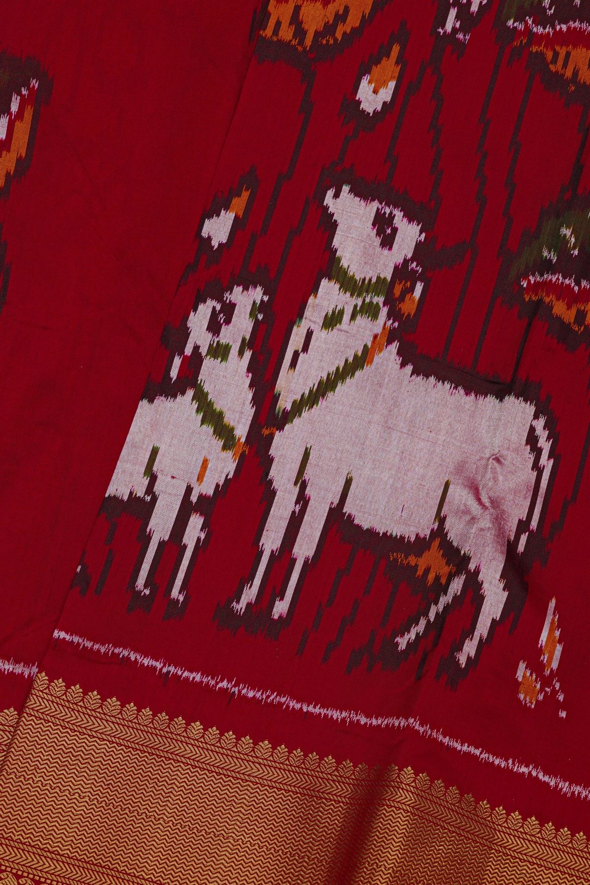 Pochampally Ikat Silk Maroon Saree With Florals And Cows Body