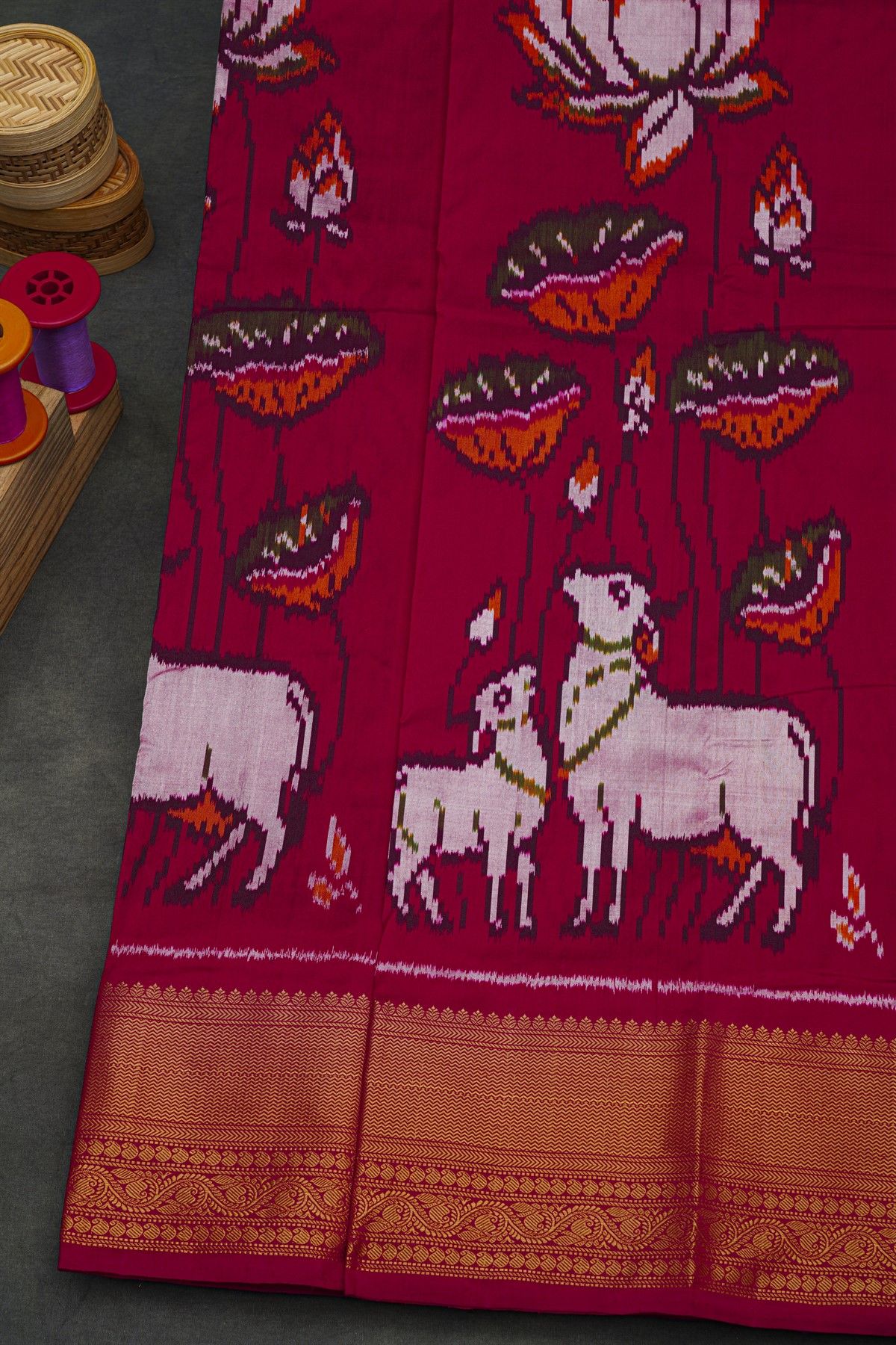 Pochampally Ikat Silk Deep Magenta Saree With Florals And Cow Body