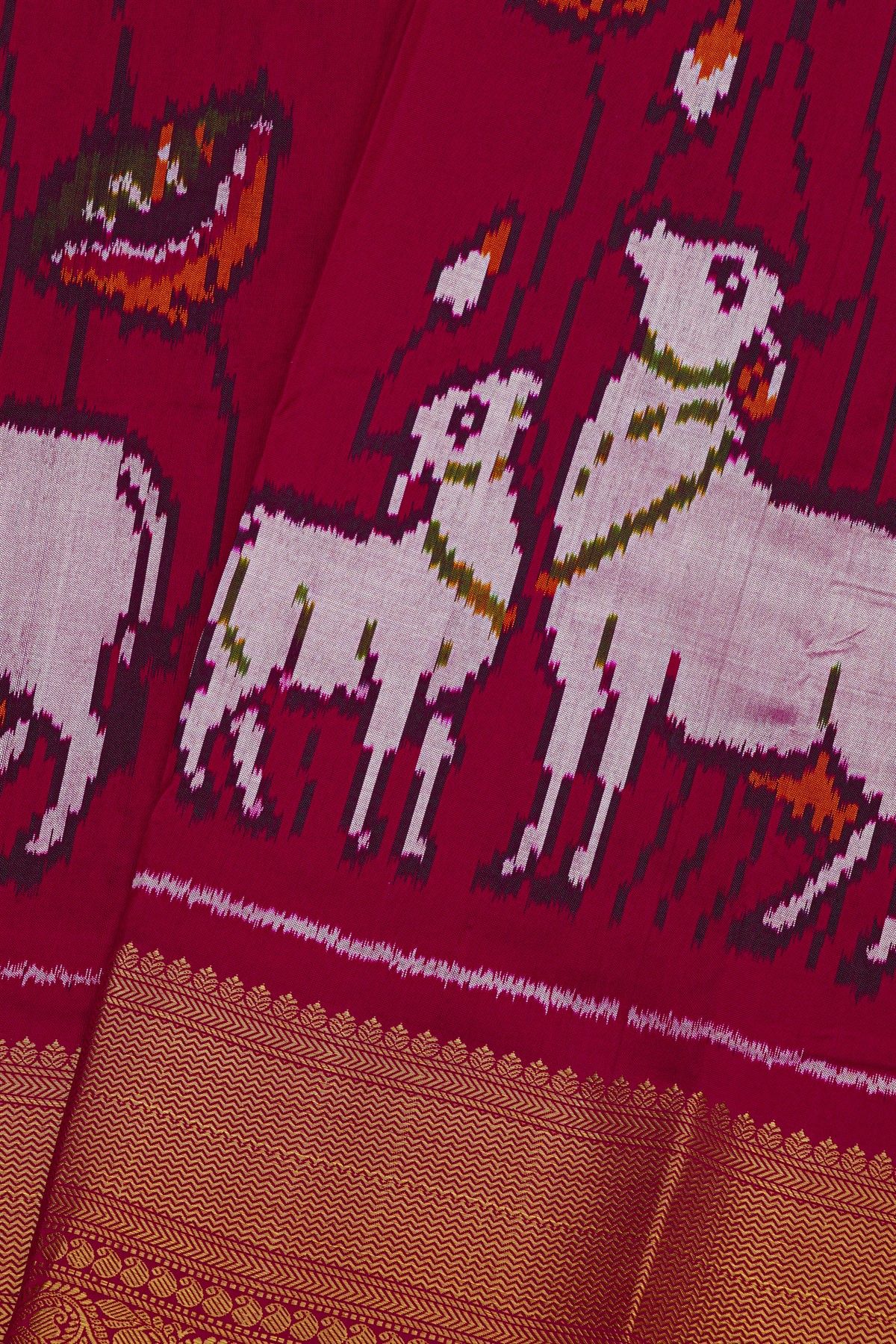 Pochampally Ikat Silk Deep Magenta Saree With Florals And Cow Body