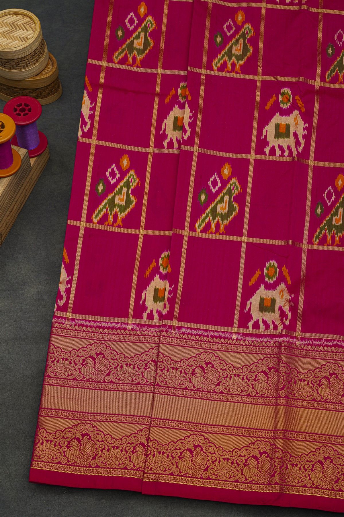 Pochampally Ikat Silk Rani Pink Saree With Floral And Peacock Border