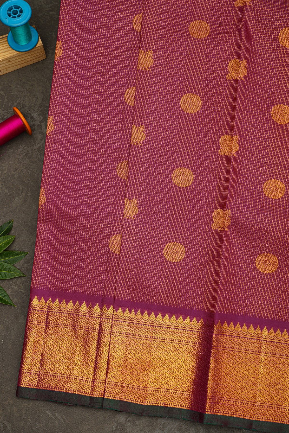 Kancheepuram Silk Rani Pink Saree With Zari Checks Floral And Peacock Buttis Body