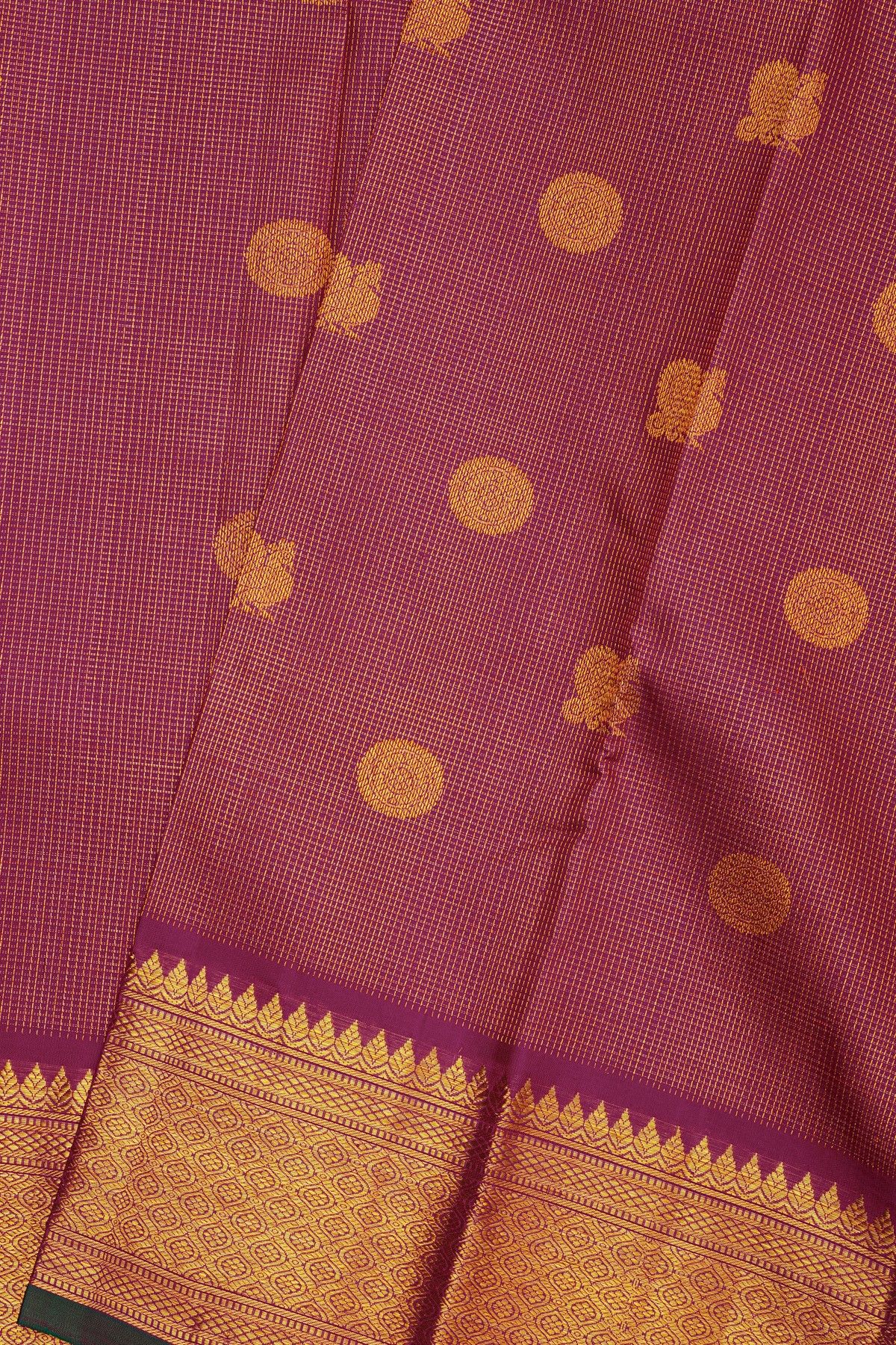 Kancheepuram Silk Rani Pink Saree With Zari Checks Floral And Peacock Buttis Body