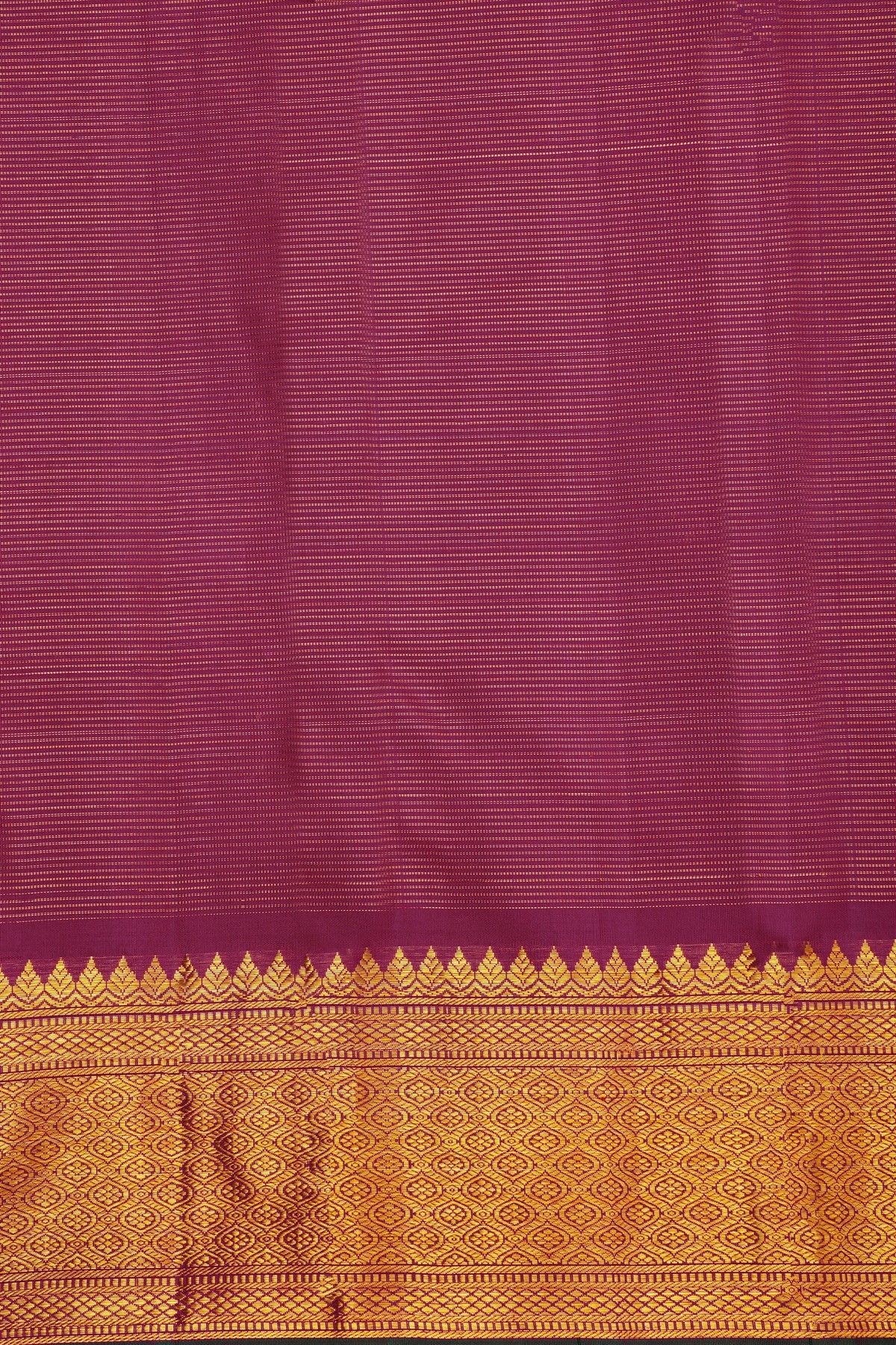 Kancheepuram Silk Rani Pink Saree With Zari Checks Floral And Peacock Buttis Body