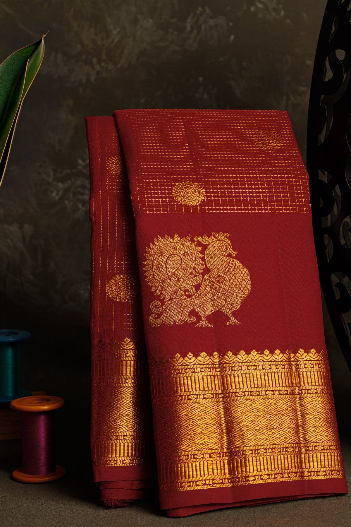 Kancheepuram Silk Red Saree With Zari Checks Floral And Peacock Buttis Body