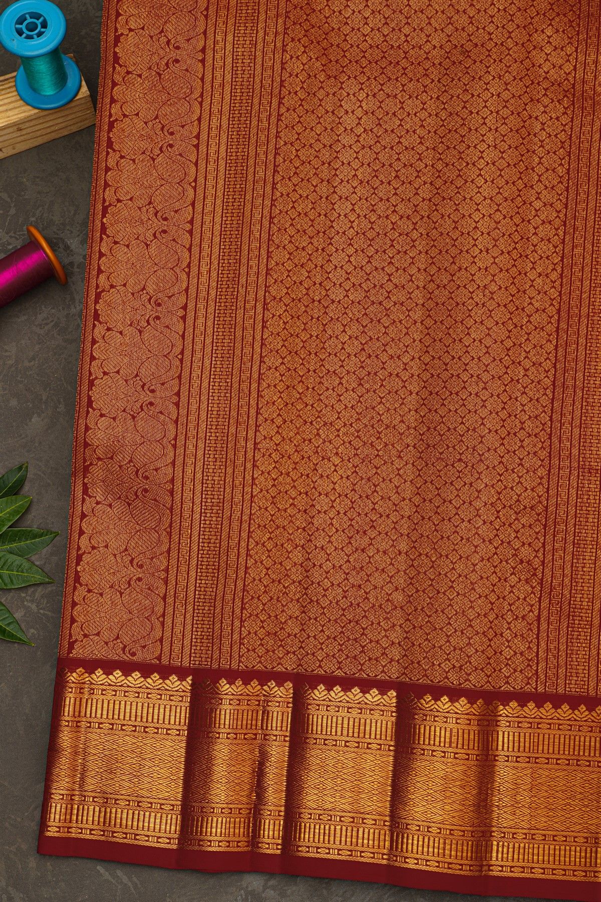 Kancheepuram Silk Red Saree With Zari Checks Floral And Peacock Buttis Body