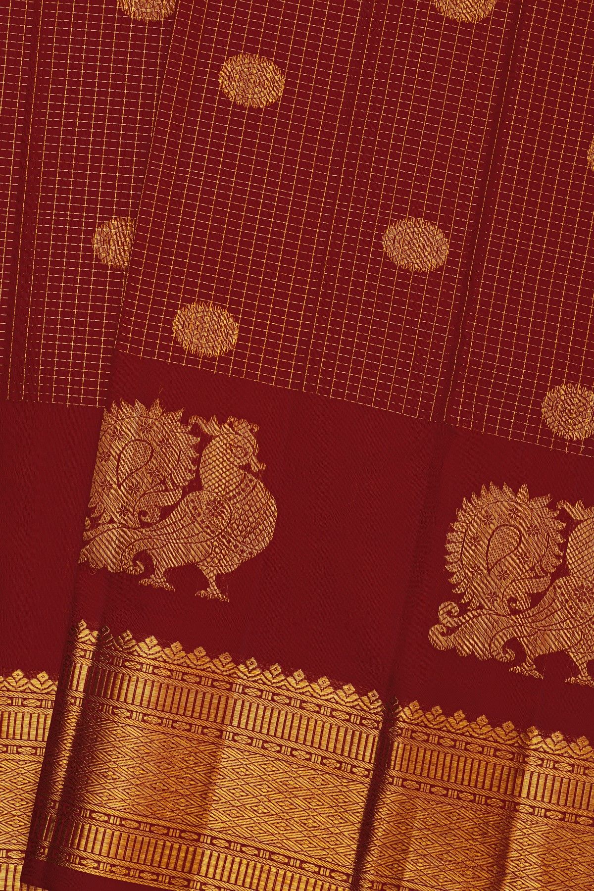 Kancheepuram Silk Red Saree With Zari Checks Floral And Peacock Buttis Body