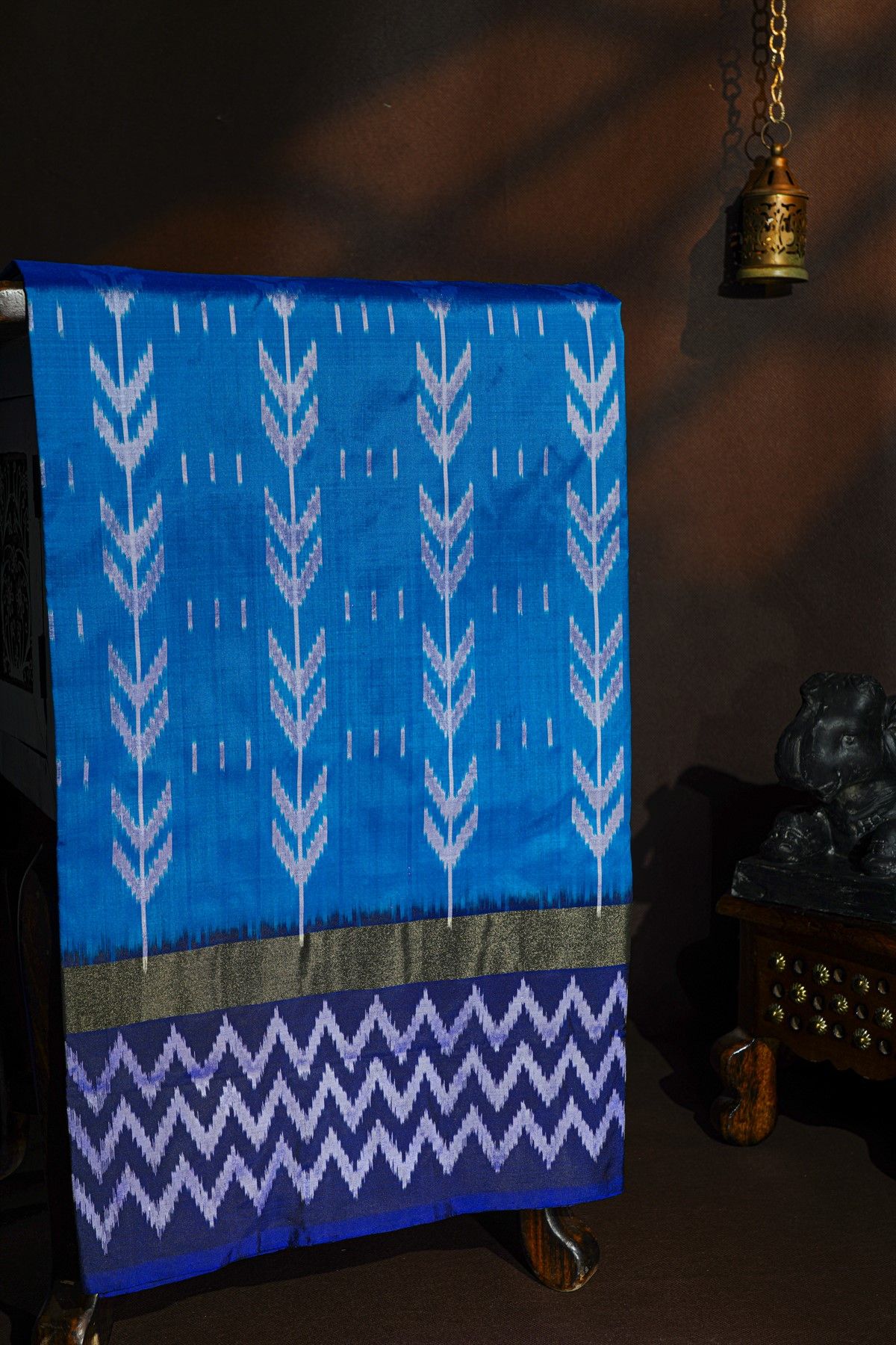Pochampally Ikat Silk Sea Blue Saree With White Chevron Motifs And Zari Border