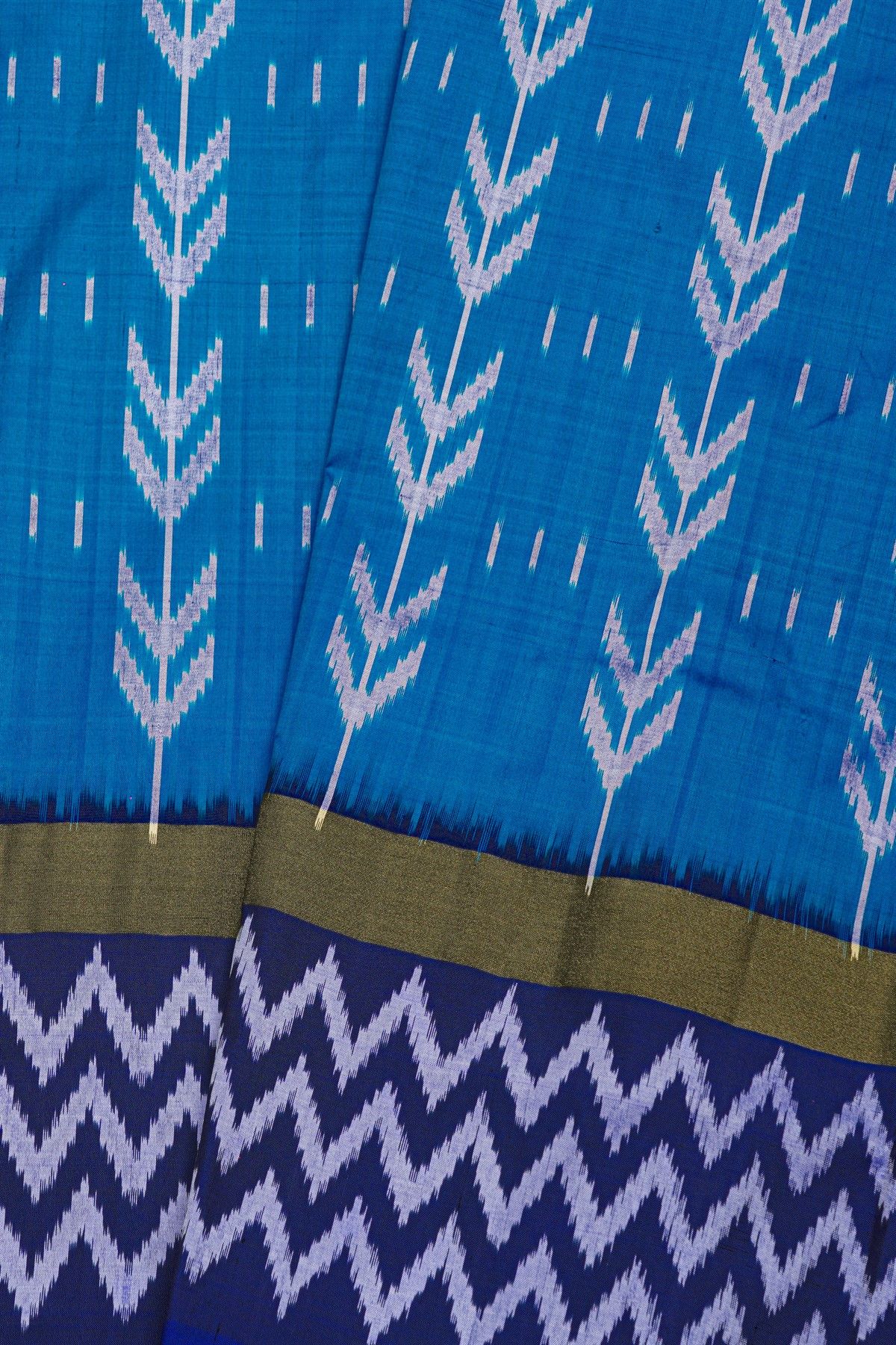 Pochampally Ikat Silk Sea Blue Saree With White Chevron Motifs And Zari Border