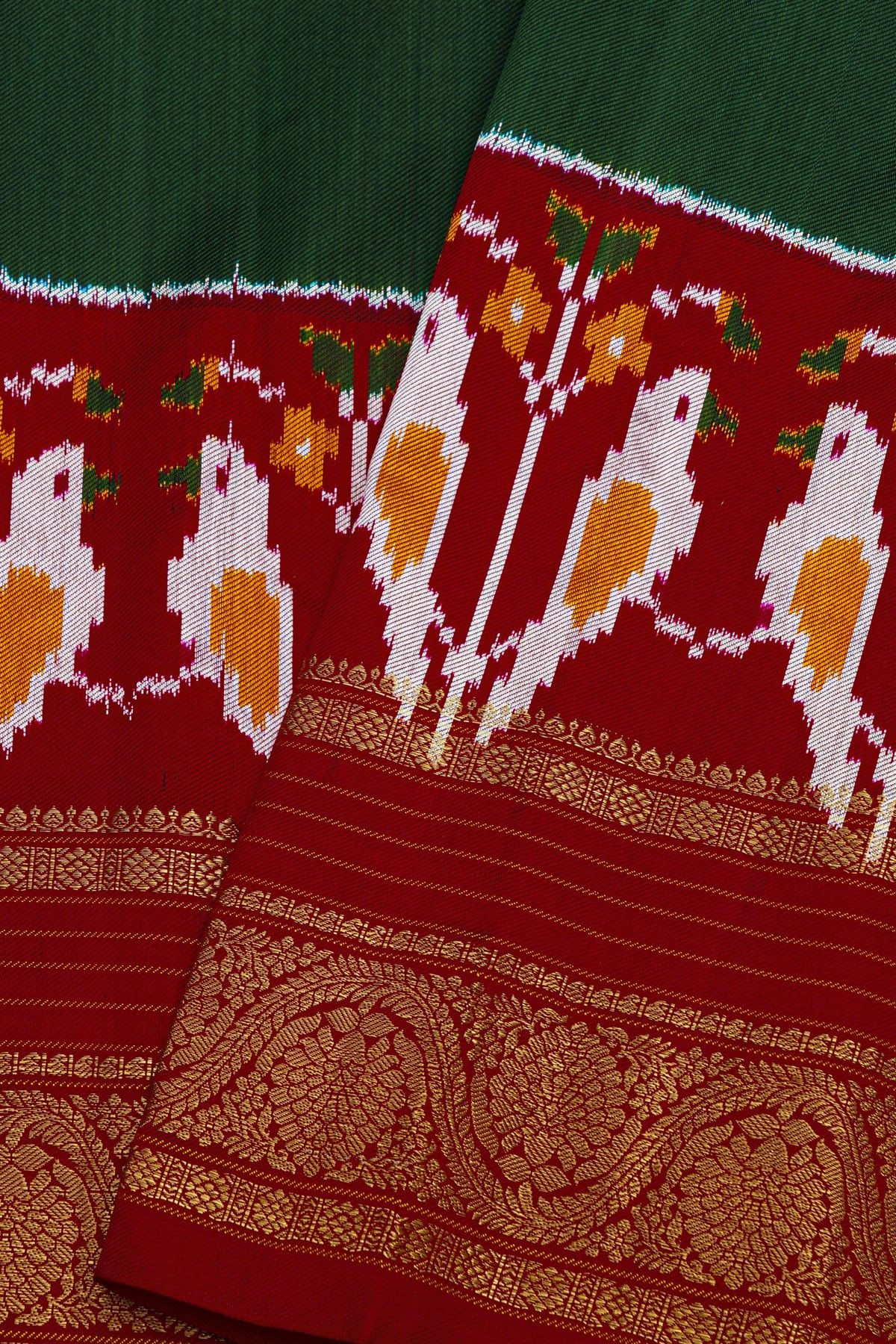 Pochampally Ikat Silk Bottle Green Saree With Florals And Parrots Border