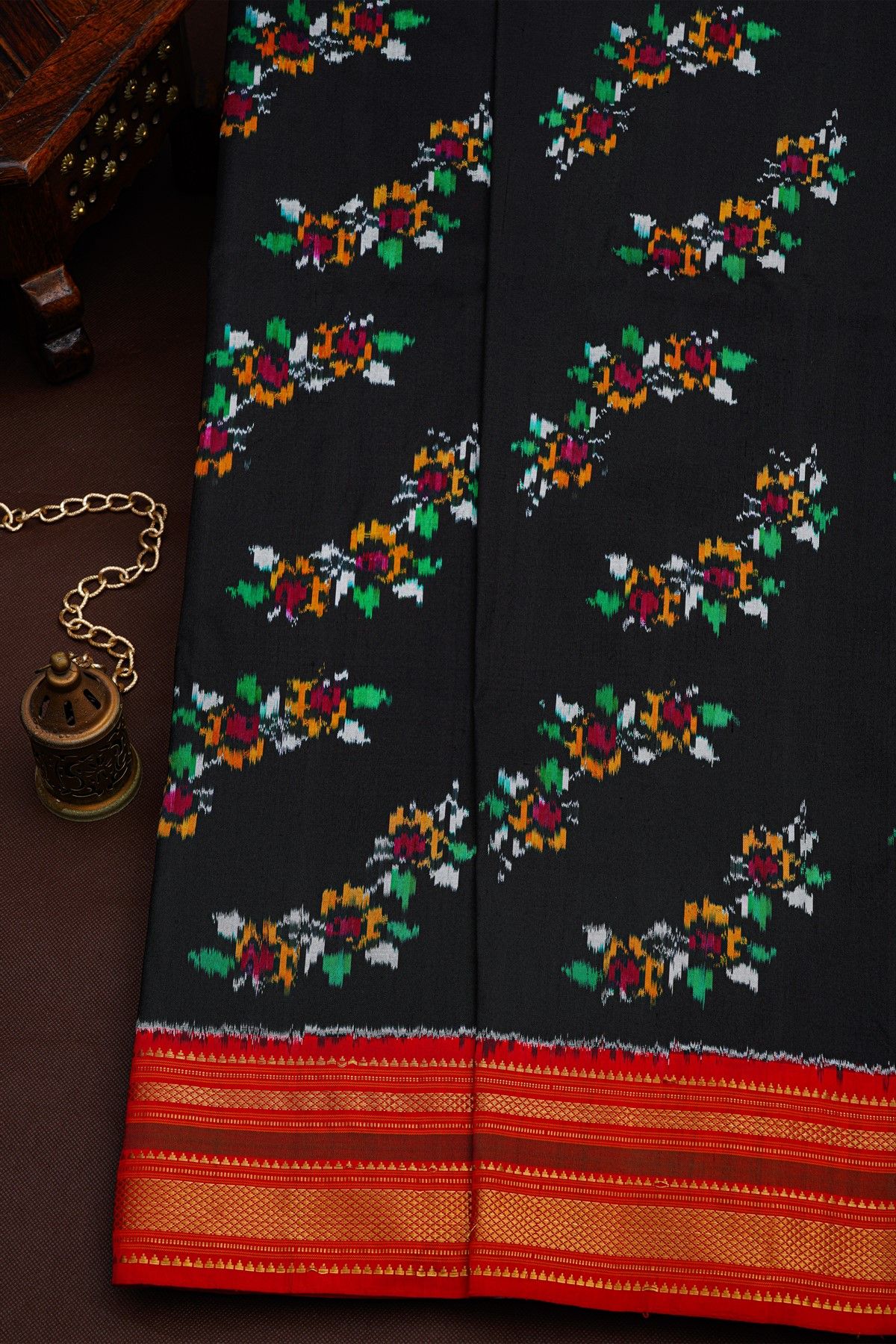 Pochampally Ikat Silk Black Saree With Florals And Leaves Body