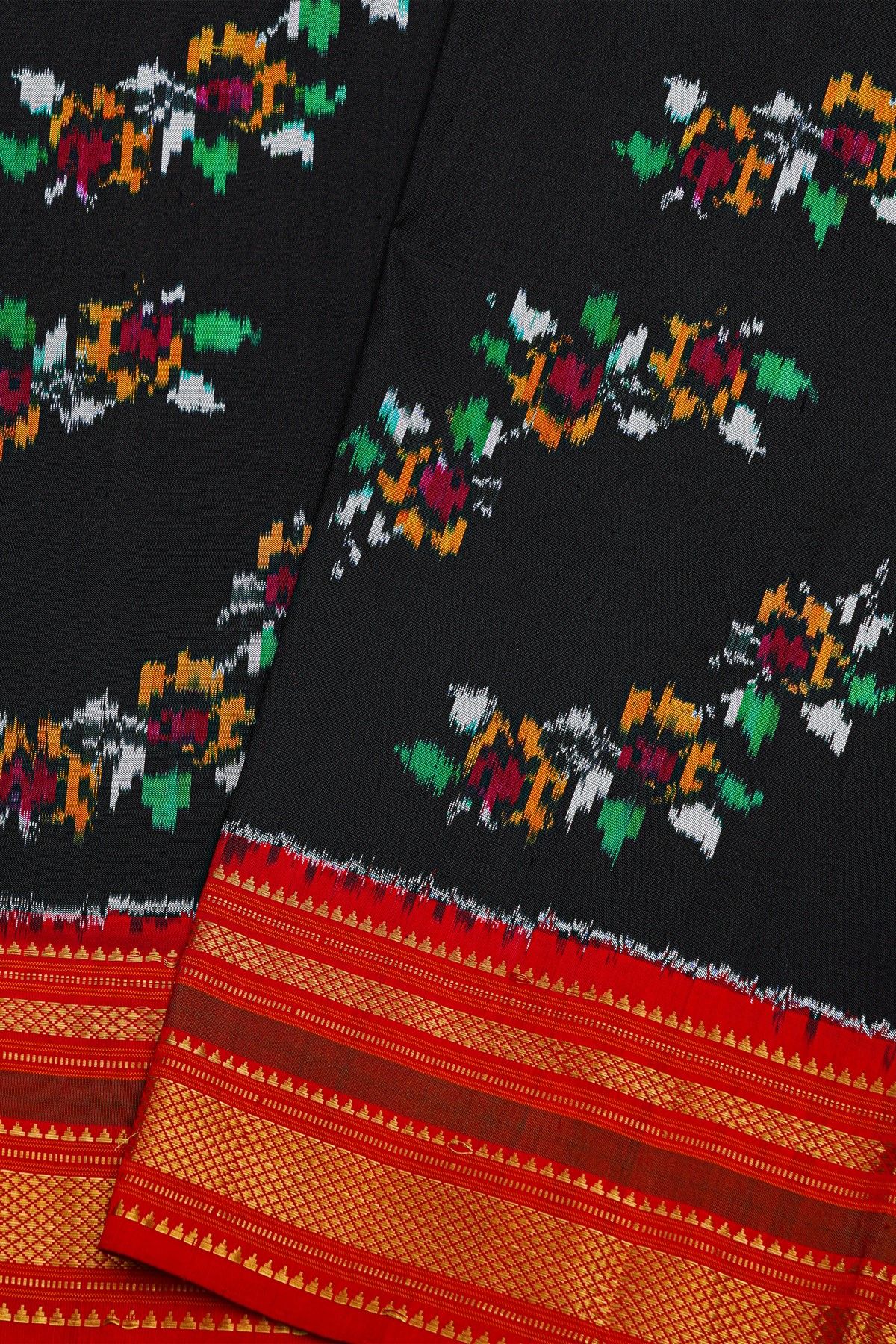 Pochampally Ikat Silk Black Saree With Florals And Leaves Body