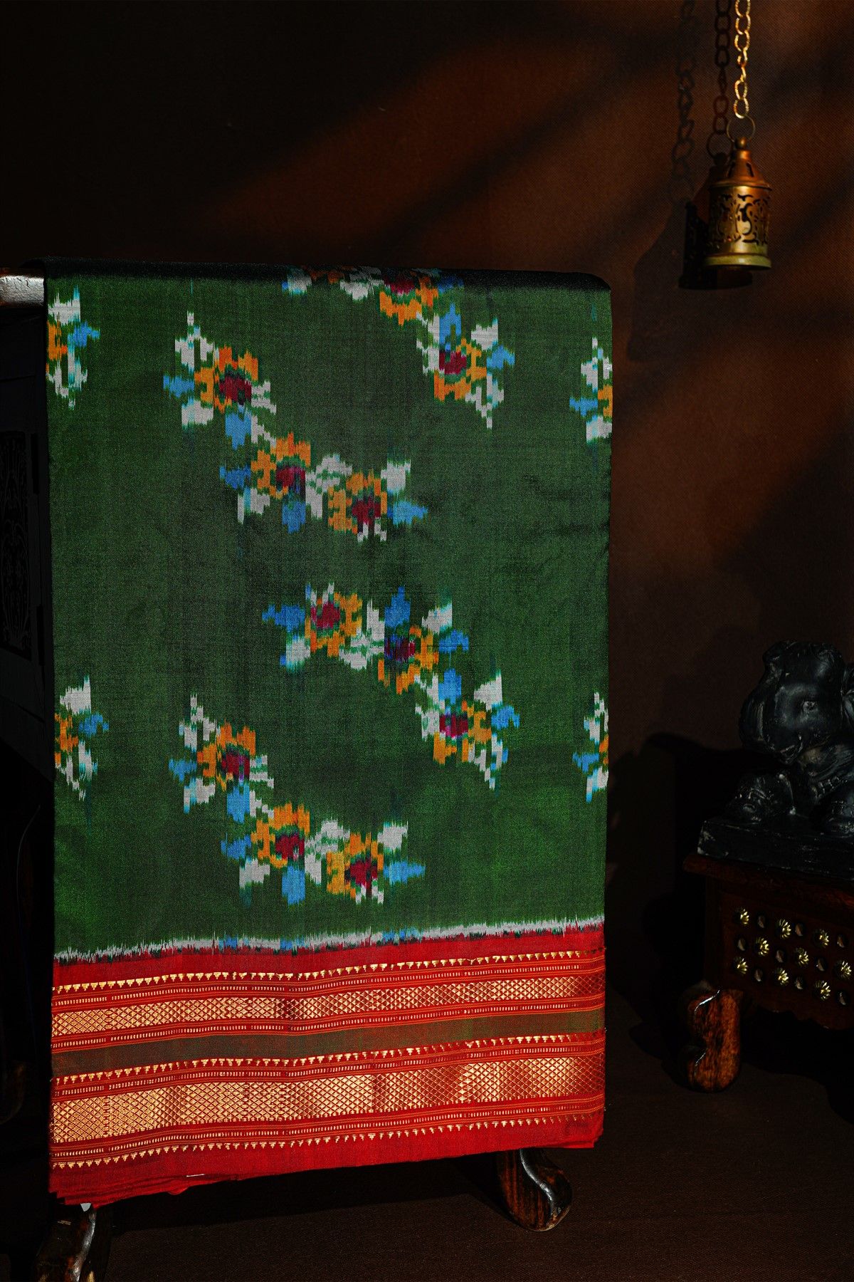 Ikat Silk Bottle Green Saree With Floral And Leaves Body