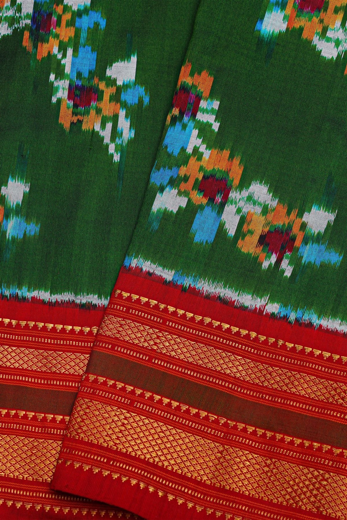 Ikat Silk Bottle Green Saree With Floral And Leaves Body