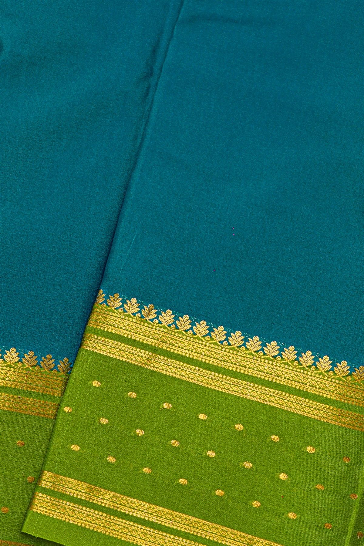 Mysore Crepe Teal Blue Saree With Florals And Buttis Border