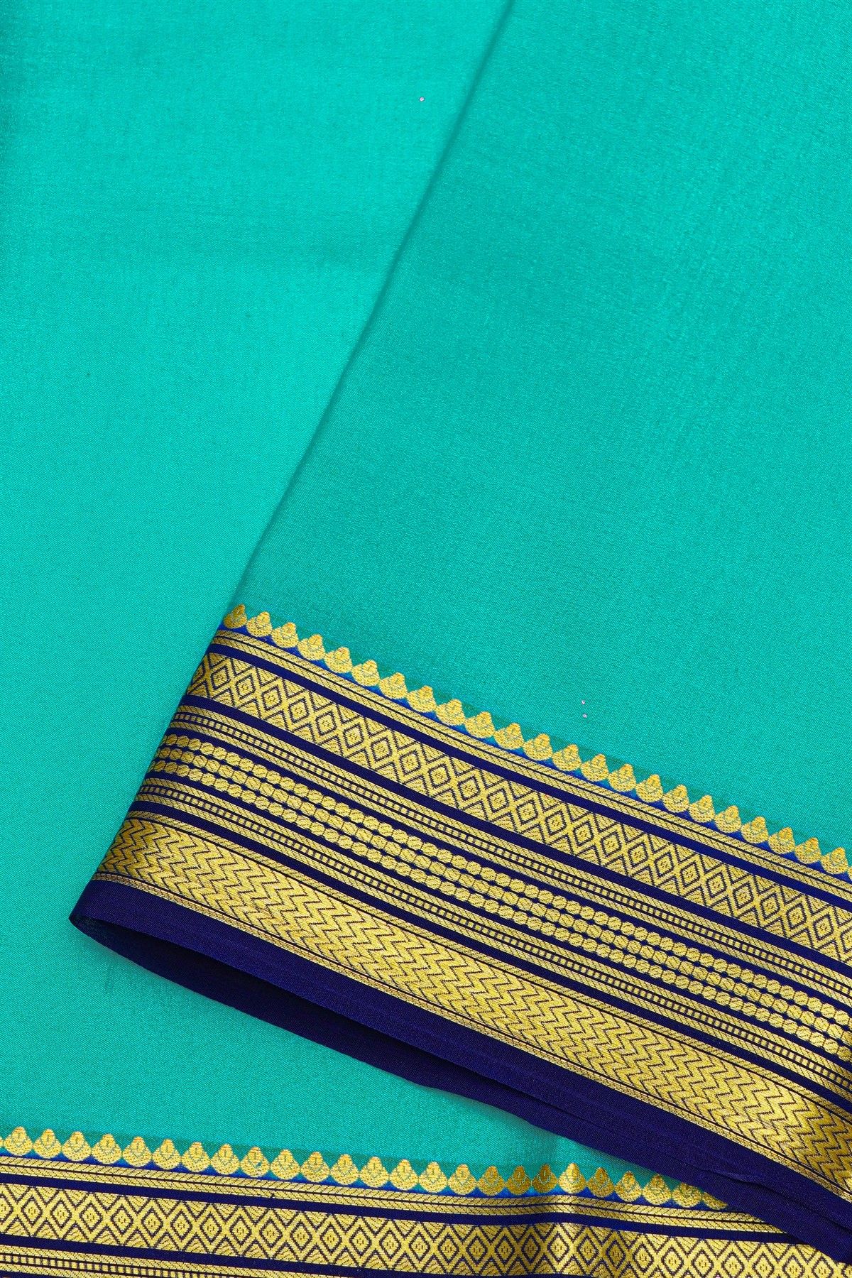 Mysore Crepe Sky Blue Saree With Florals And Zari Lines Border