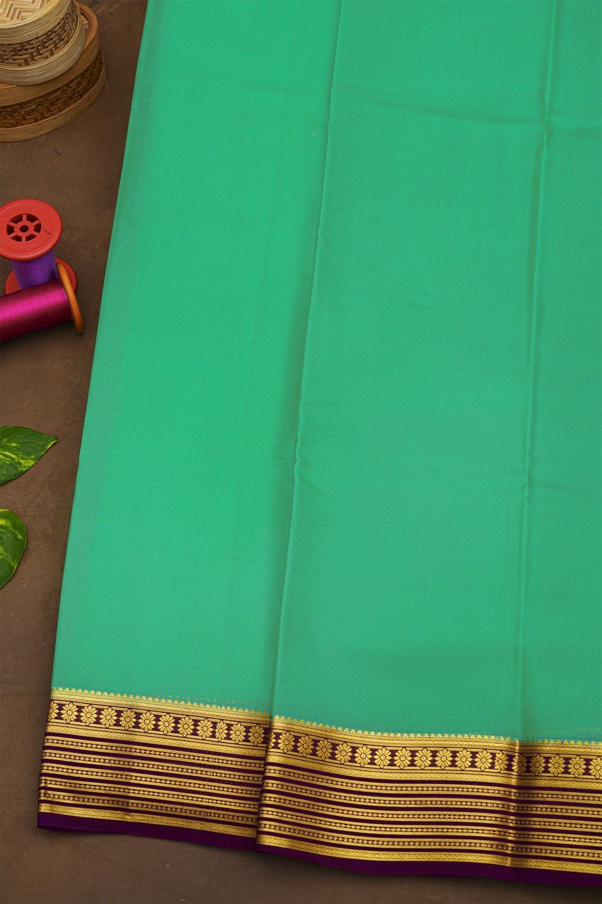 Mysore Crepe Sea Green Saree With Florals And Zari Lines Border