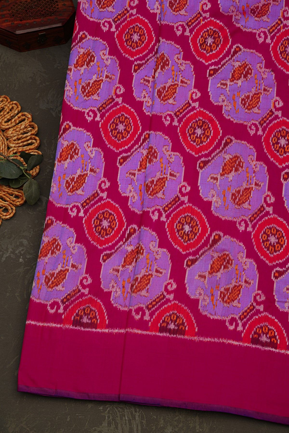 Pochampally Ikat Silk Magenta Saree With Floral And Fish Circles Body