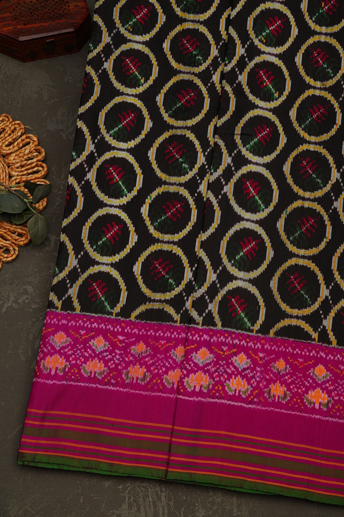 Pochampally Ikat Silk Black Saree With Floral And Leaf Lines Border