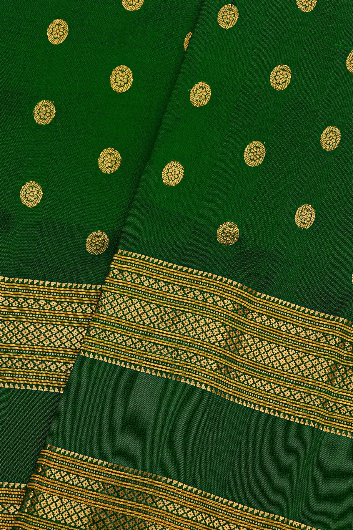 Gadwal Silk Bottle Green Saree With Floral Buttis In Zari Body