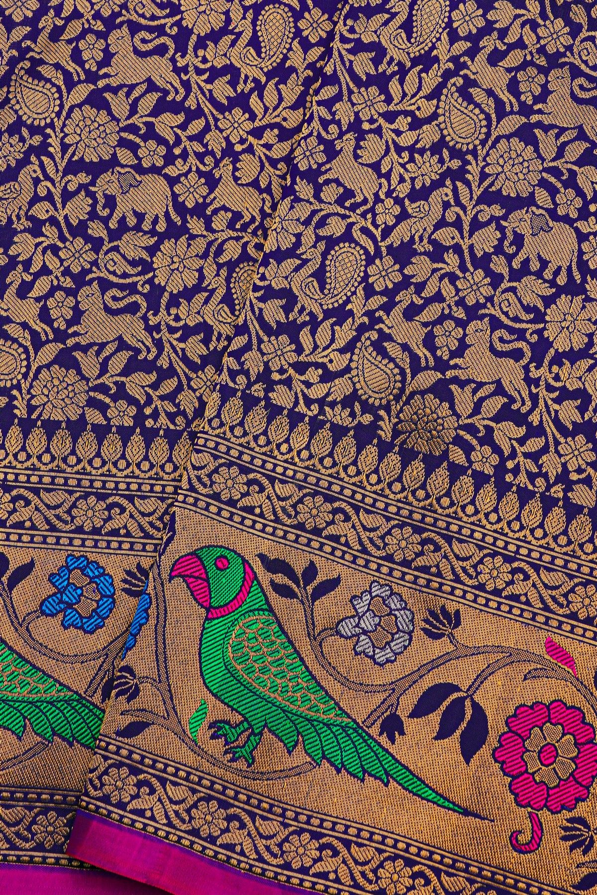 Gadwal Silk Navy Blue Saree With Florals And Parrots Border