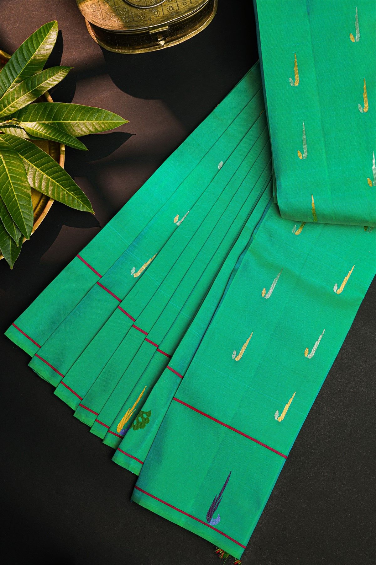 Gadwal Silk Sea Green Saree With All Over Muniya Buttis Body