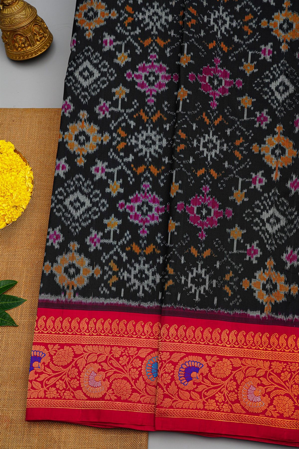 Gadwal Silk Black Saree With Florals And Leaves In Ikat Print Body