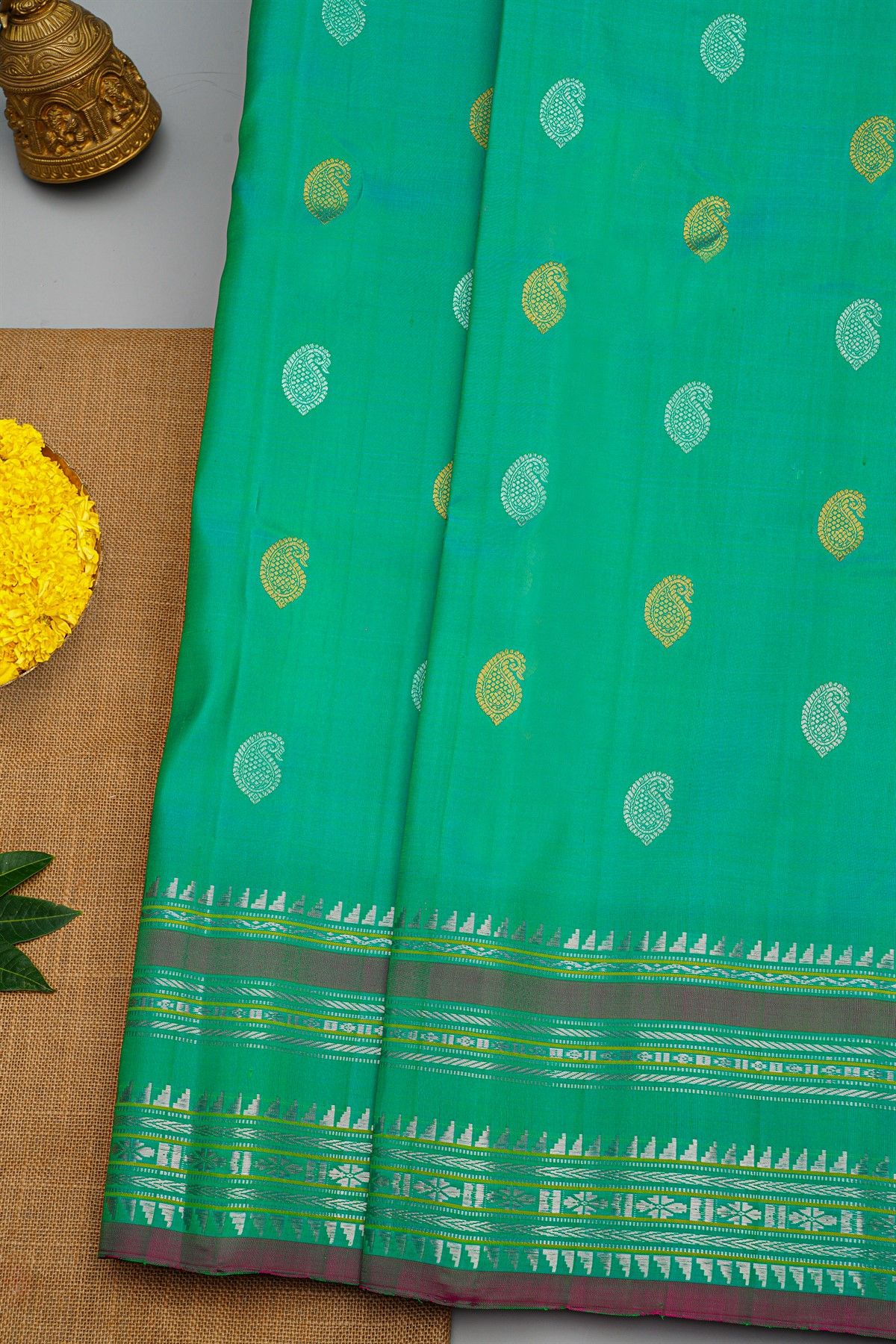 Gadwal Silk Rama Green Saree With Florals And Buttis Border