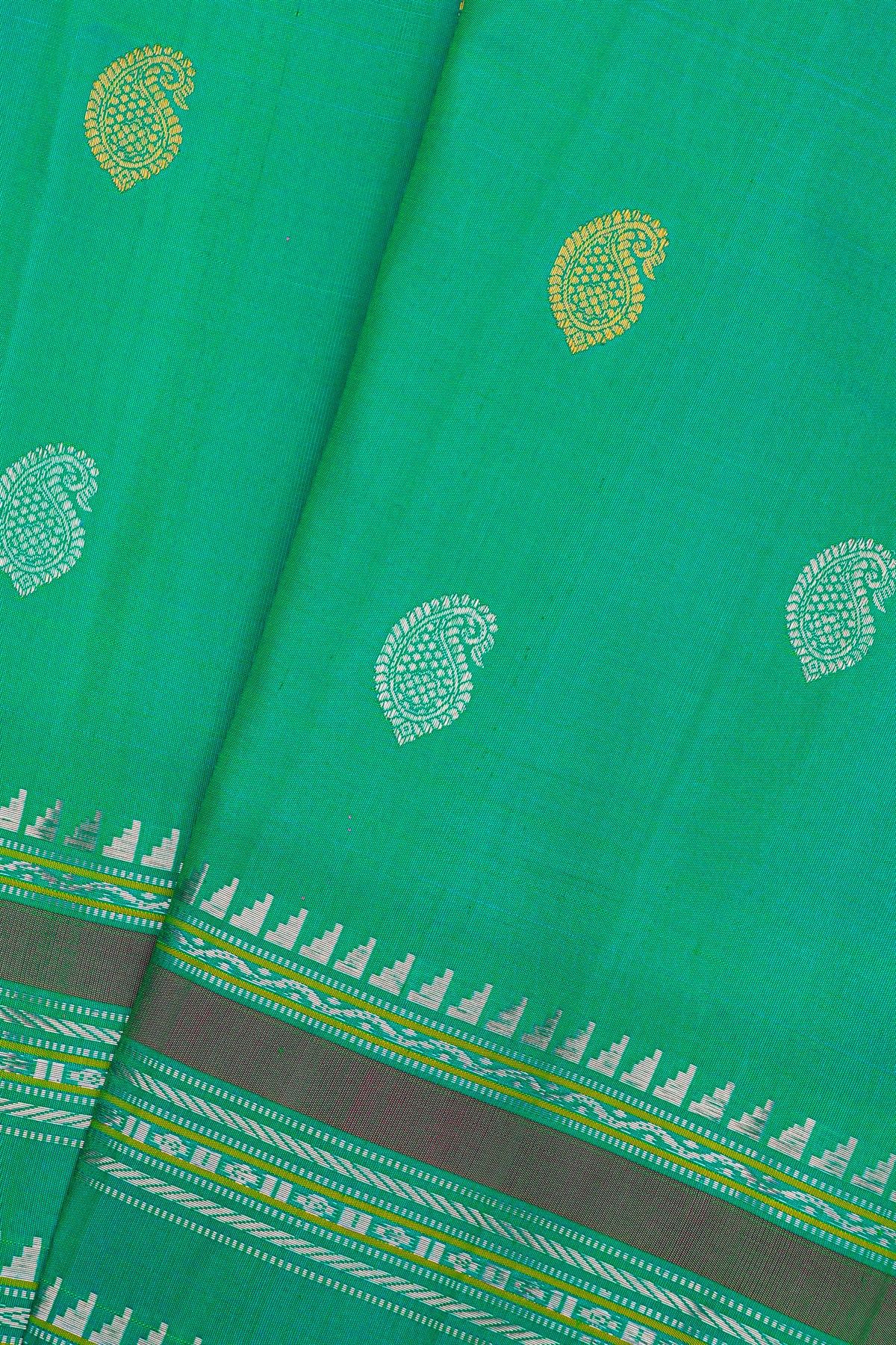 Gadwal Silk Rama Green Saree With Florals And Buttis Border